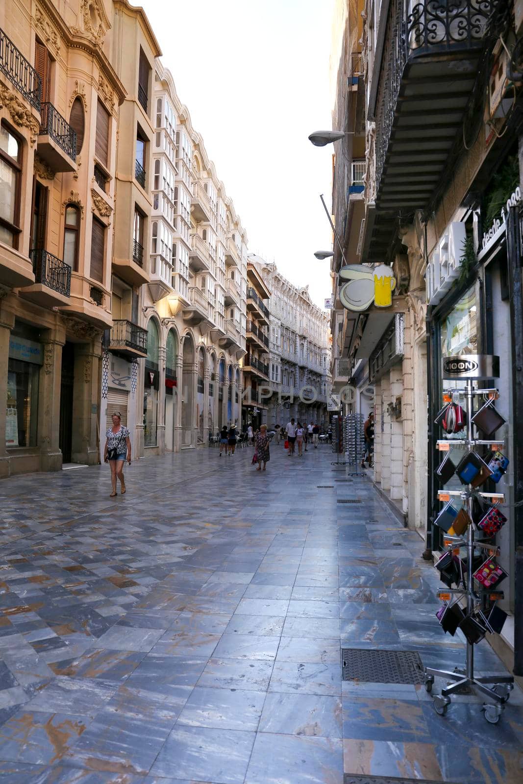 Cartagena, Murcia, Spain- July 18, 2022: Street of Cartagena called calle mayor next to city hall