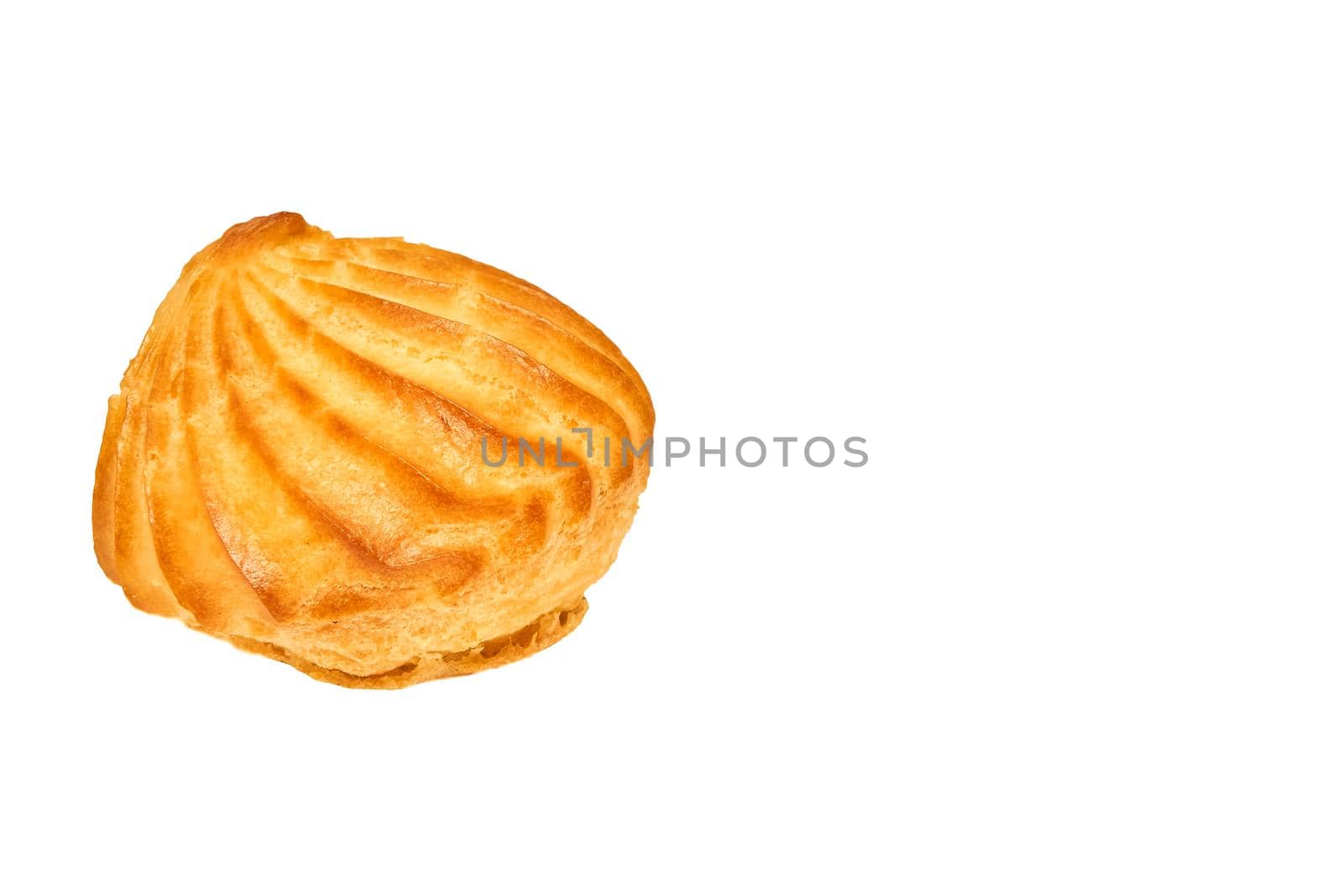 an item of soft, sweet food made from a mixture of flour, shortening, eggs, sugar, and other ingredients, baked and often decorated. Delicious appetizing profiterole eclair cake on a white background