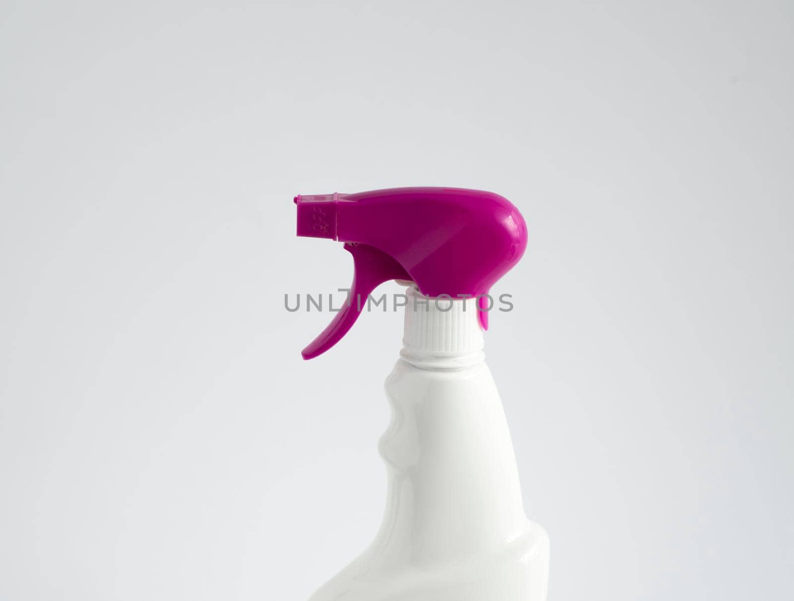White blank plastic spray detergent bottle with a violet sprayer isolated on white background. Packaging template mockup. by vovsht
