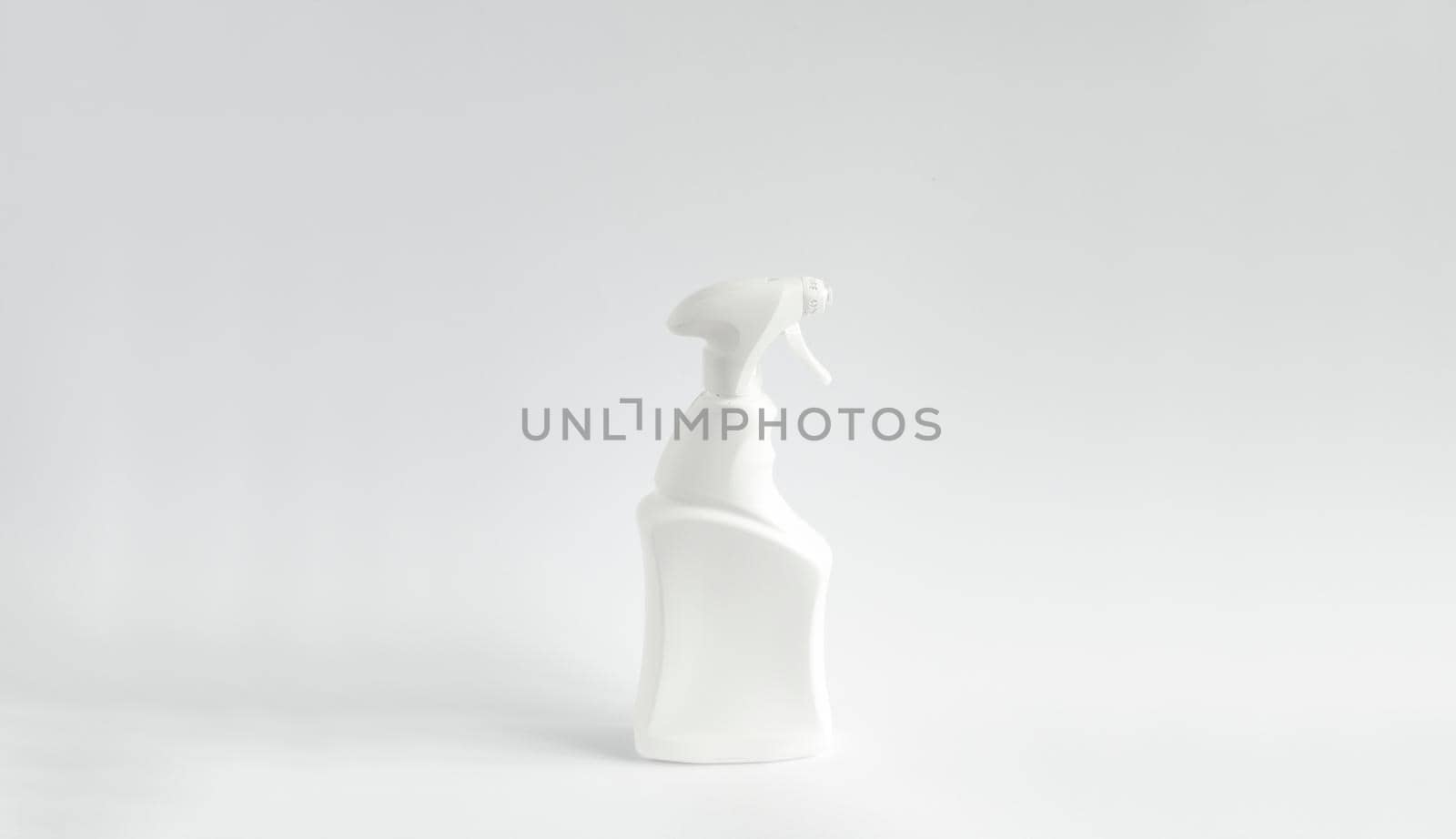 White blank plastic spray detergent bottle isolated on white background. Packaging template mockup