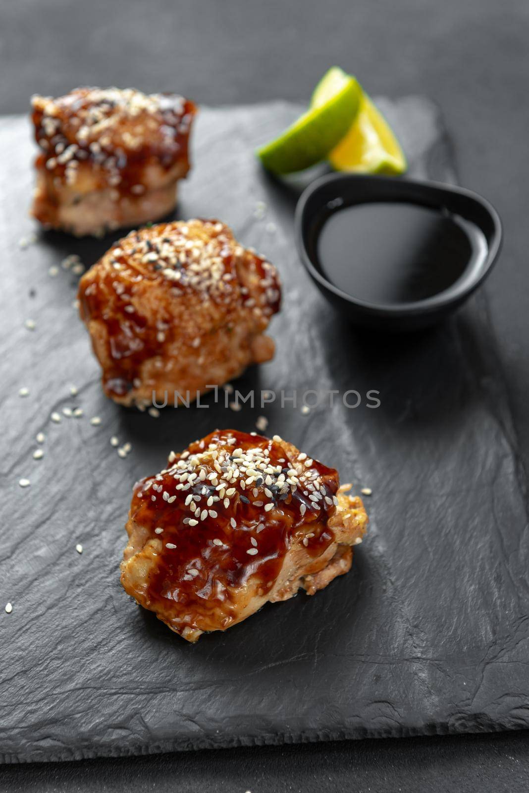 Asian food. Fast food street food. Chicken in teriyaki sauce and sesame. a traditional Japanese way of frying using a common sweet sauce in Japanese cuisine.