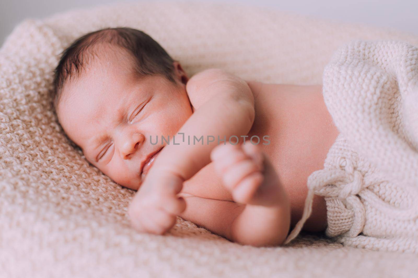 Sleeping newborn baby lifestyle . Sweet baby's dream. An article about newborns.