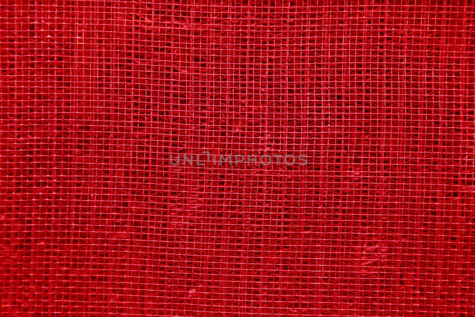 Top view of the surface of a metal radiator. Abstract background of metal wire fabric.