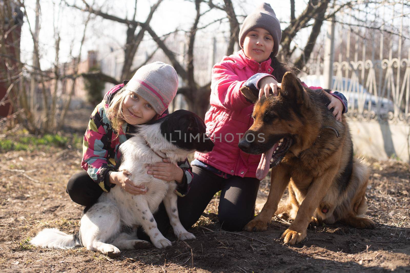two little girls with a german shepherd by Andelov13