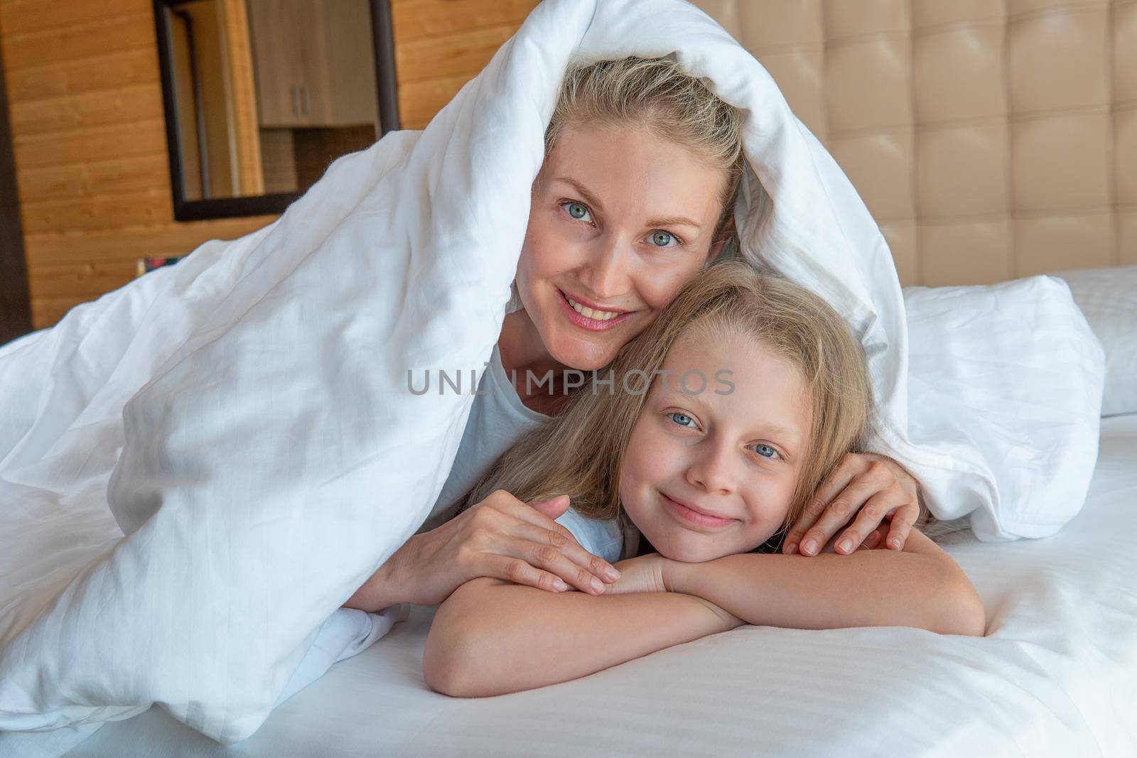 Blanket family over daughter glad woman bed head phone beautiful, concept view morning from relax and dream home, attractive bedtime. Healthy face serene,