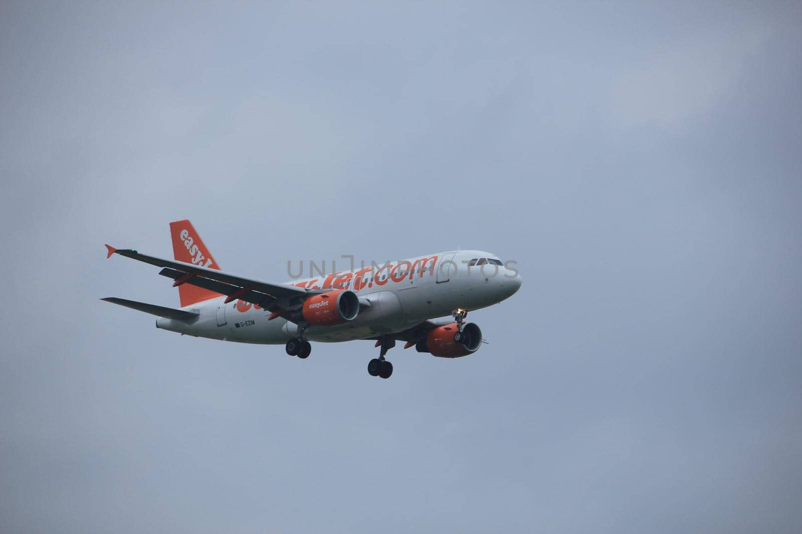 Amsterdam, the Netherlands - June 22nd 2017: G-EZIM easyJet Airbus A319 approaching Polderbaan runway at Schiphol Amsterdam Airport, the Netherlands