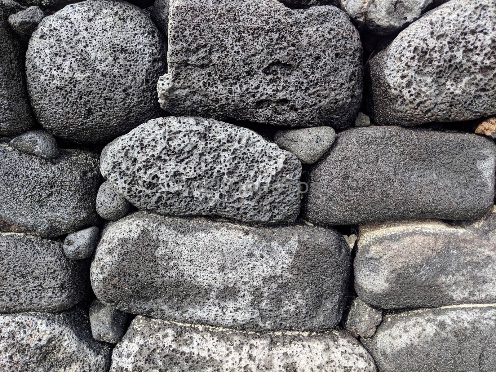 Close-up of a Old lava stone wall  by EricGBVD