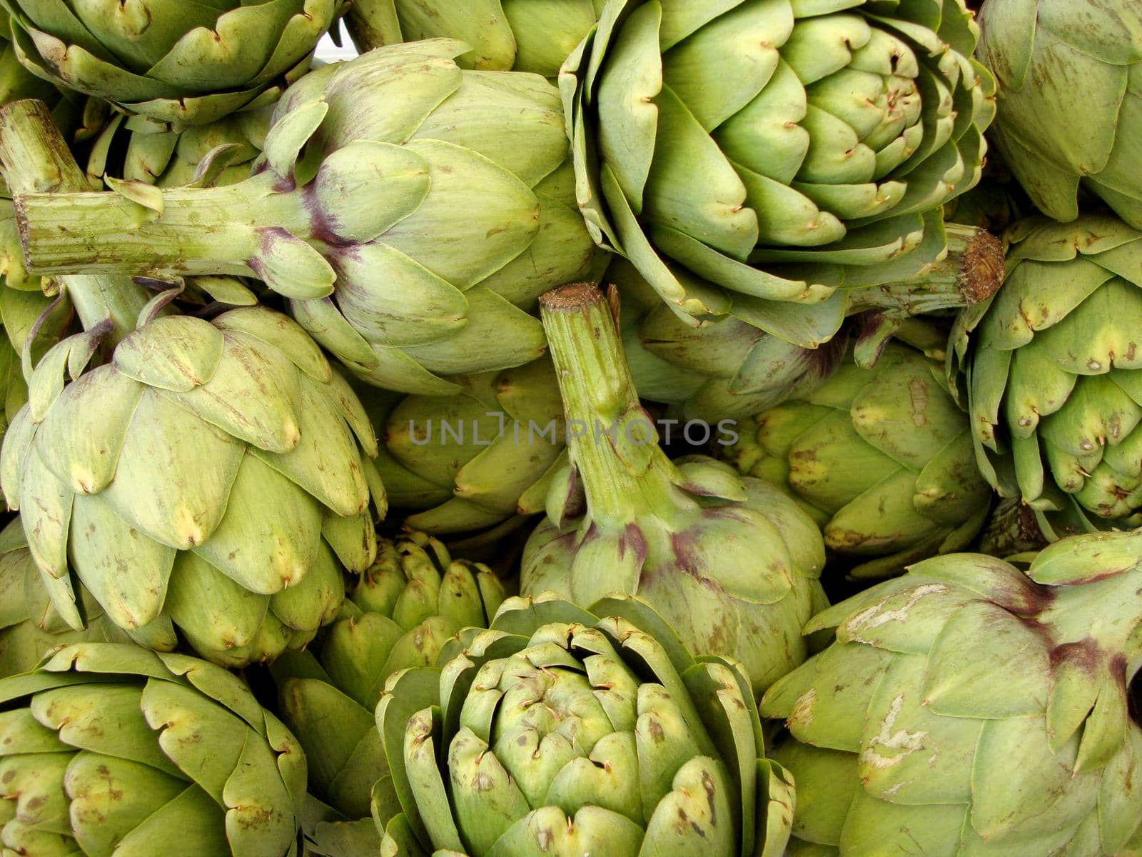 Pile of Artichoke on display at a farmers market in San Francisco, CA