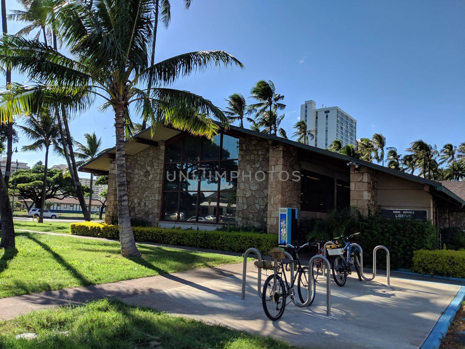 Waikiki -  October 23, 2018: Bikes parked in front of Waikiki-Kapahulu Public Library.
