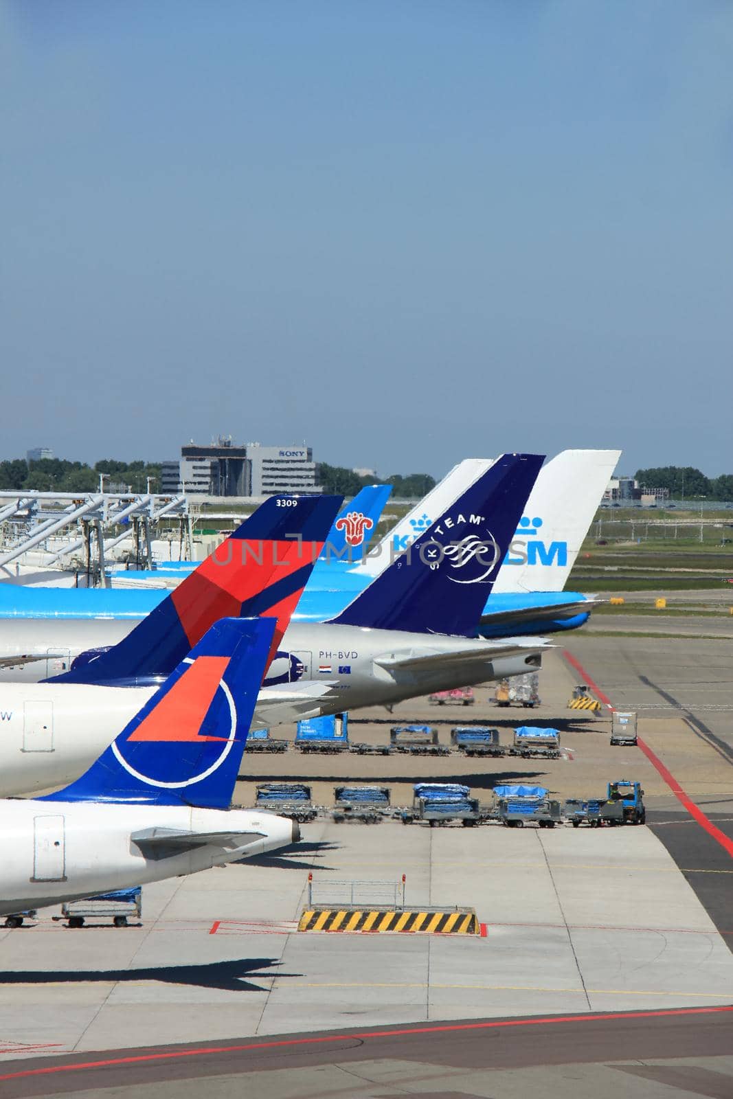 Amsterdam The Netherlands -  May 26th 2017: Planes of several major airlines parked at the gates at Schiphol Amsterdam International Airport