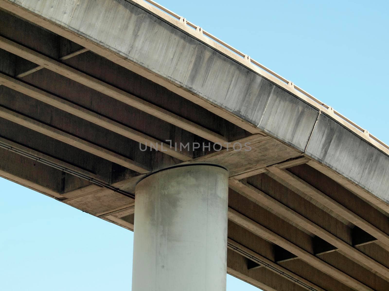 Highway overpass on large pillar towers in the sky in San Francisco Mission Bay area in California.