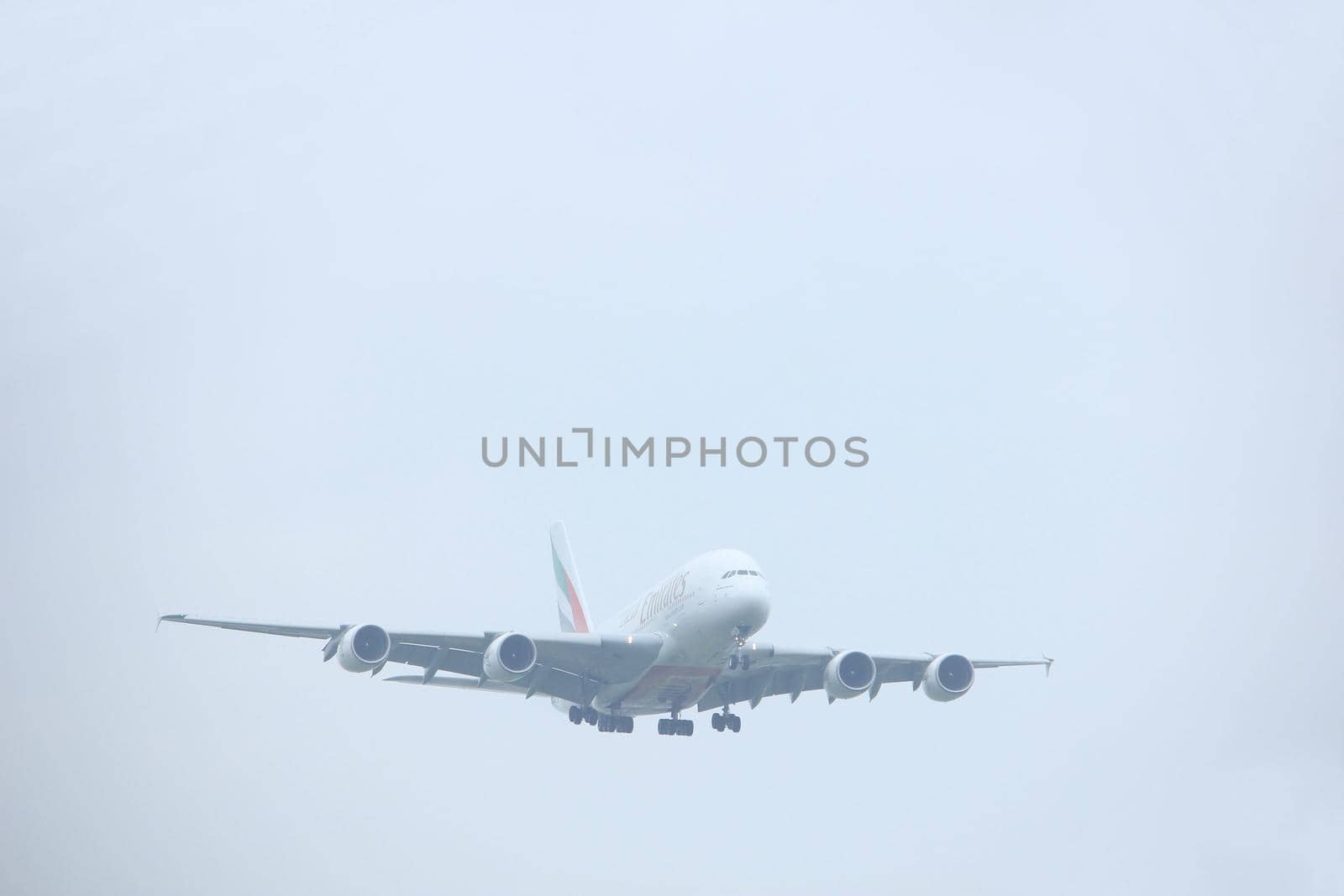 Amsterdam, the Netherlands - June 22nd 2017: A6-EUE Emirates Airbus A380 approaching Polderbaan runway at Schiphol Amsterdam Airport, the Netherlands
