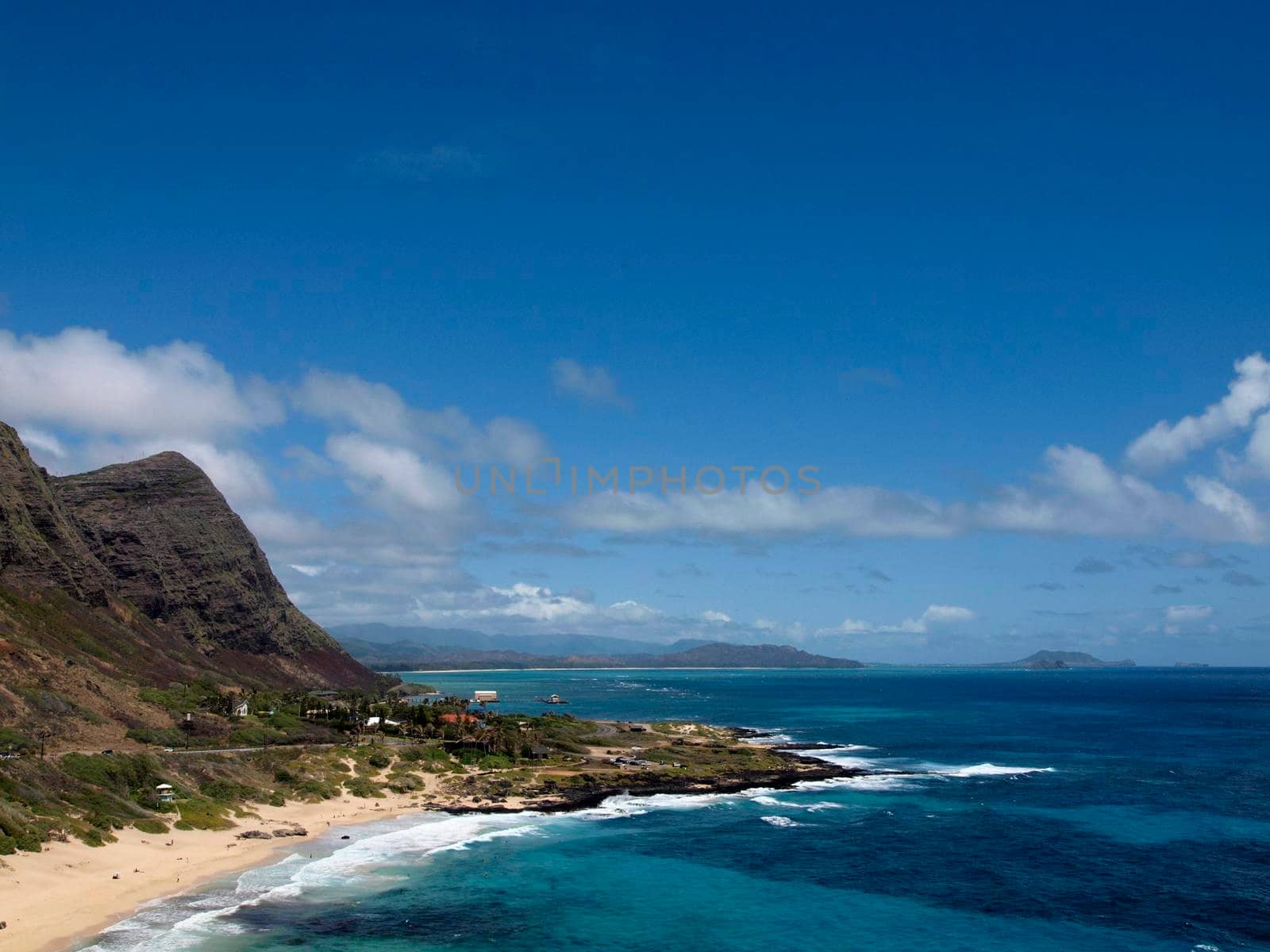 Aerial view of Waves crash on Makapuu Beach by EricGBVD