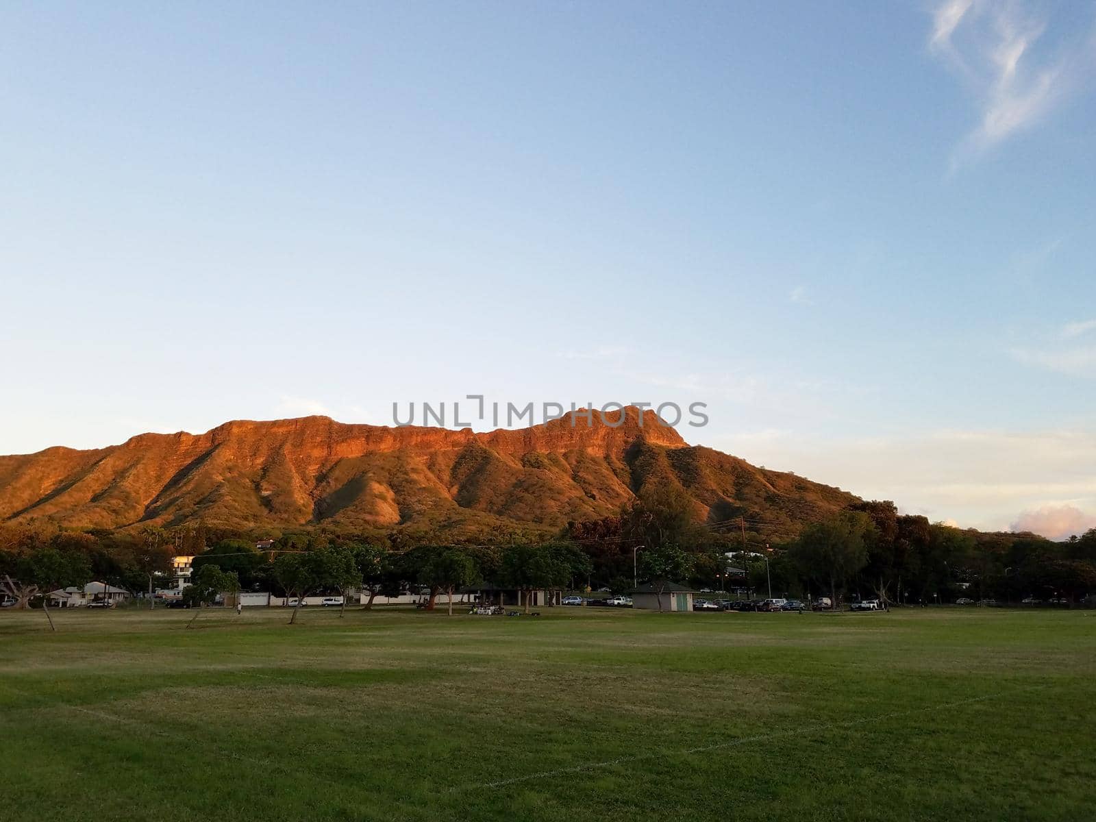 Kapiolani Park at during day with Diamond Head and clouds by EricGBVD