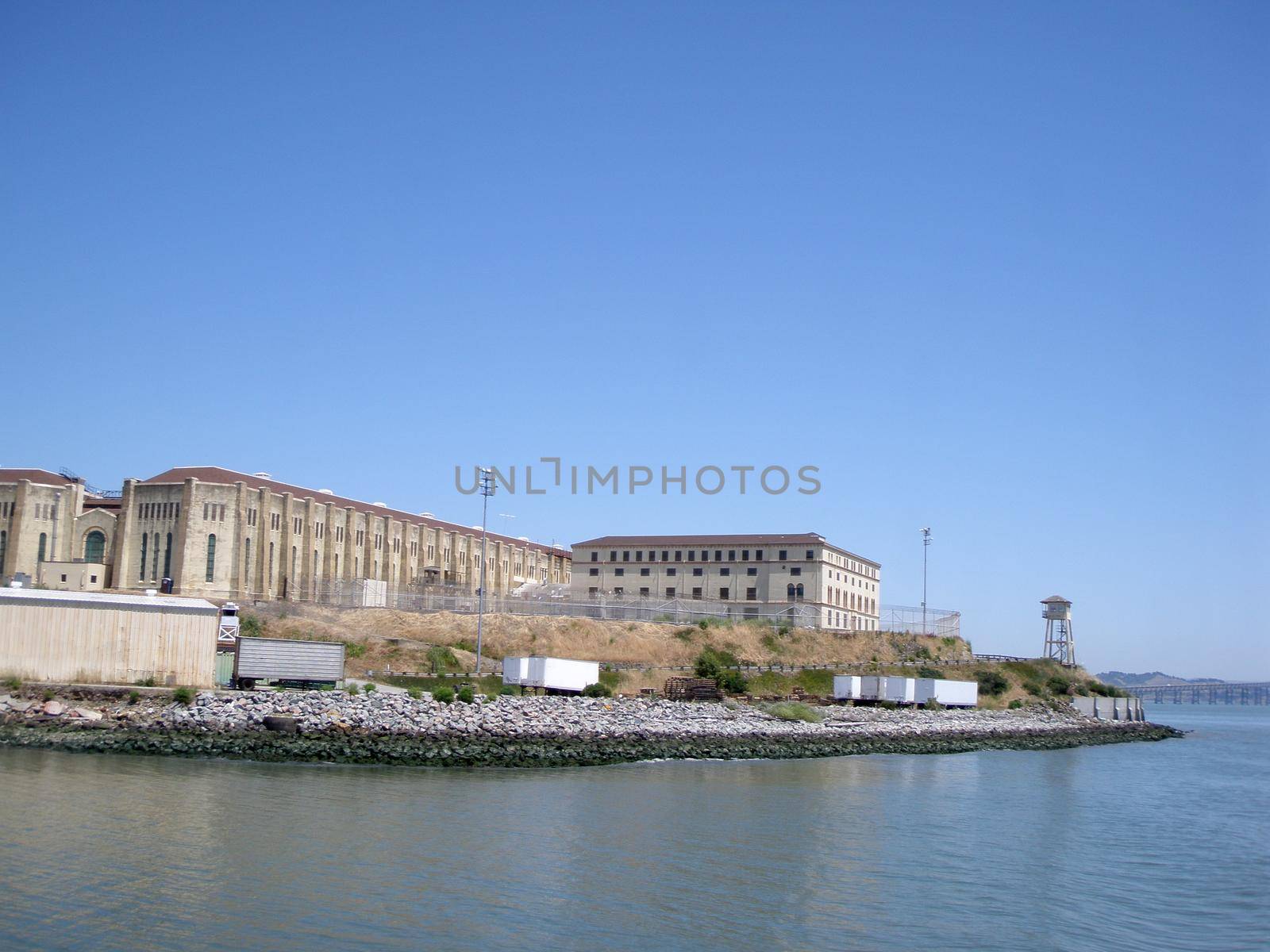 San Quentin State Prison California taken from a passing ferry with lookout tower.