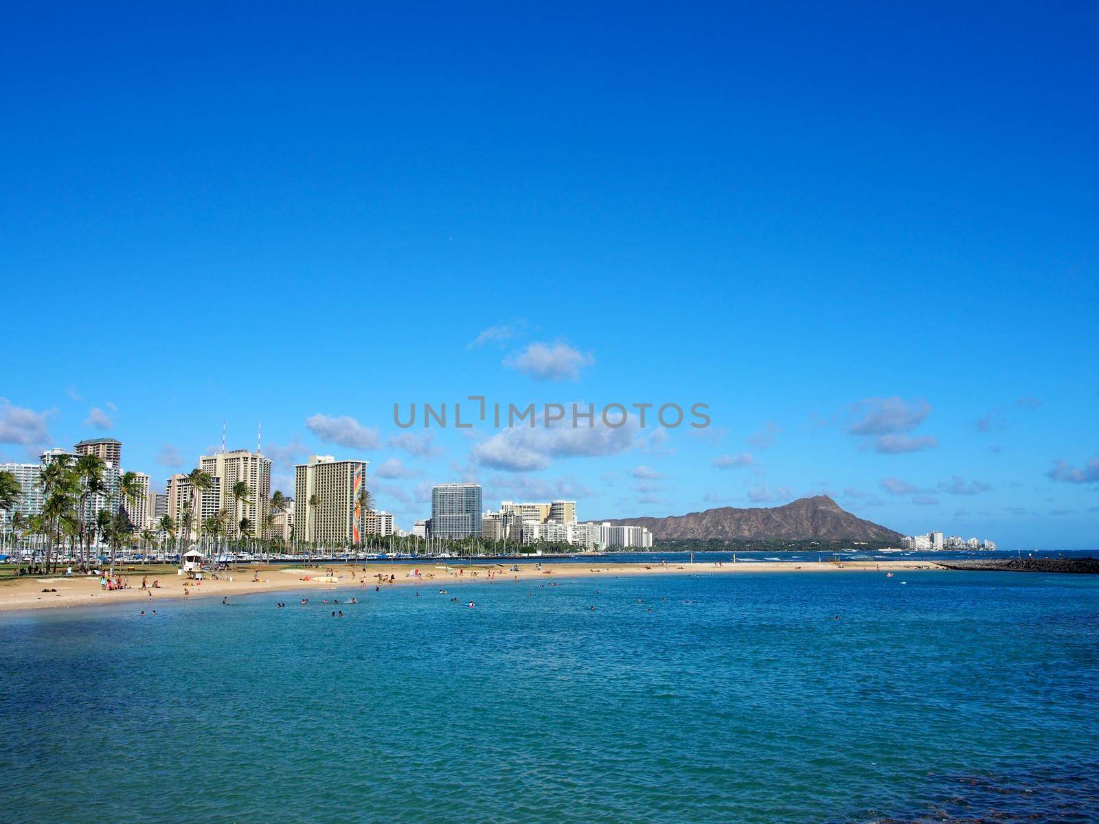 Honolulu - August 13, 2017: People play at Beach on Magic Island in Ala Moana Beach Park on the island of Oahu, Hawaii.  On a beautiful day.



































