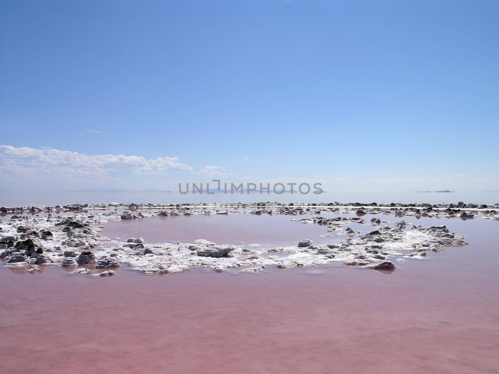 Center of the Spiral Jetty, Robert Smithson's masterpiece earthwork, which really has pink water due to unquie algae growing because of the high salt content is on the north side of the Great Salt Lake, about two-and-a-half hours from Salt Lake City.     Taken August 25, 2005.
