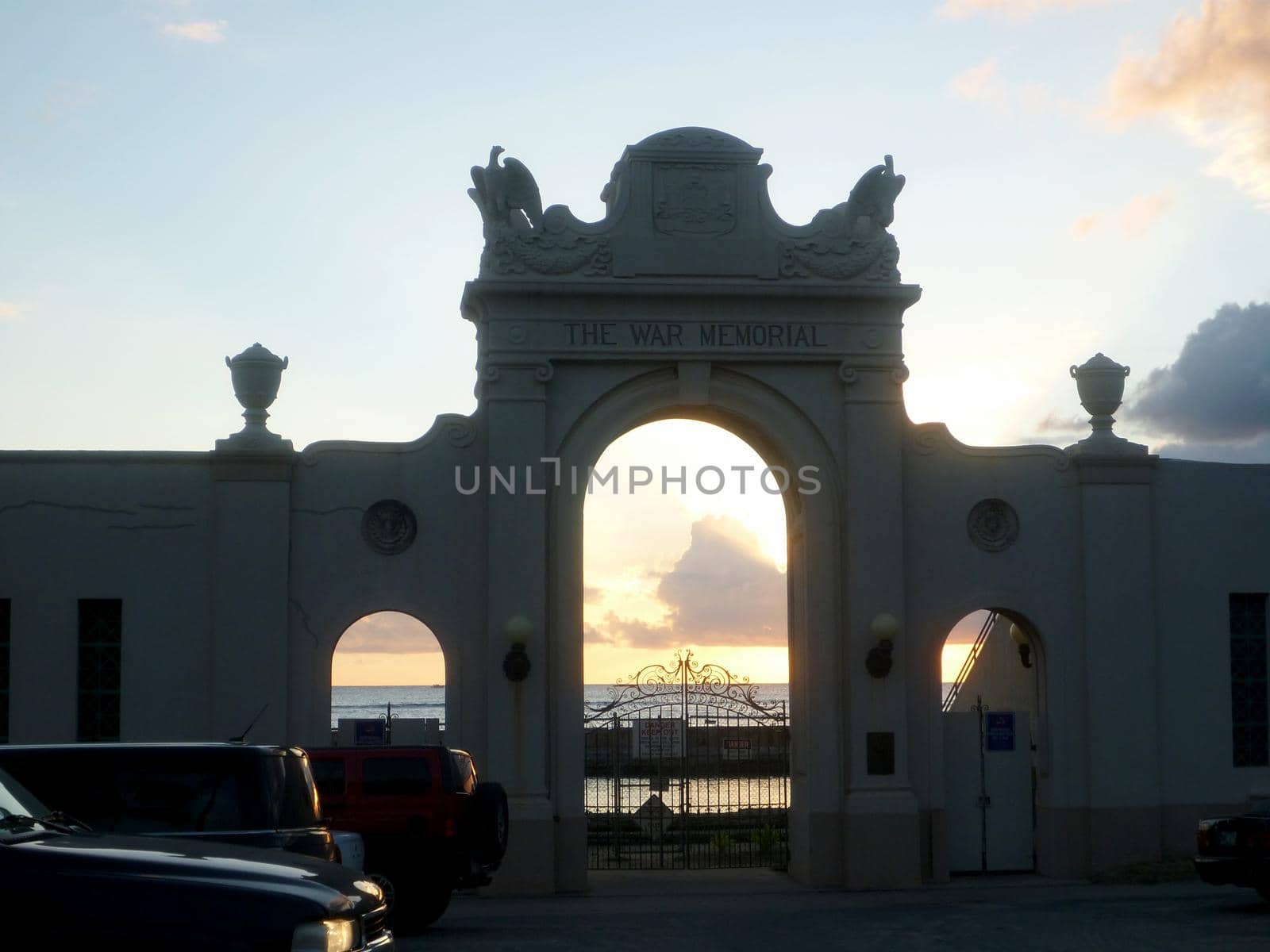 Waikiki -  September 20, 2014:  The Waikiki Natatorium War Memorial at sunset which is a war memorial in Honolulu, Hawaii, USA, built in the form of an ocean water public swimming pool. The natatorium was built as living memorial dedicated to "the men and women who served during the great war" (now known as World War I).