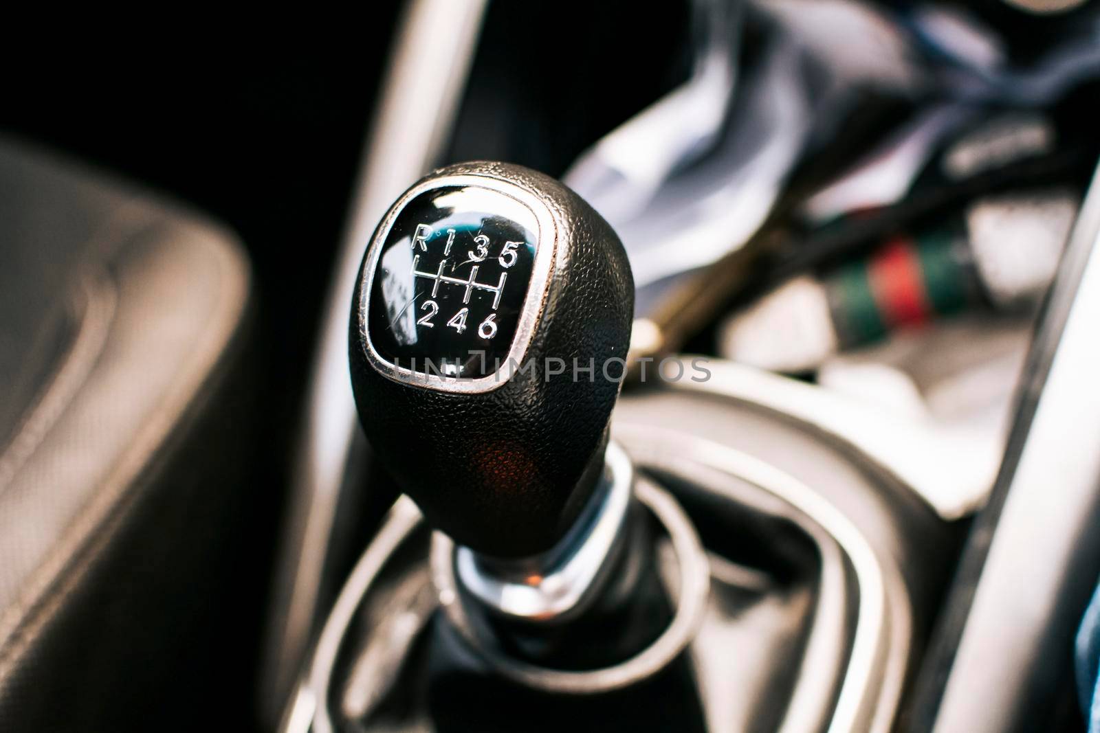 Manual gear lever of a car. Close up of a car gear stick manual transmission, Image of a car gear stick manual transmission.