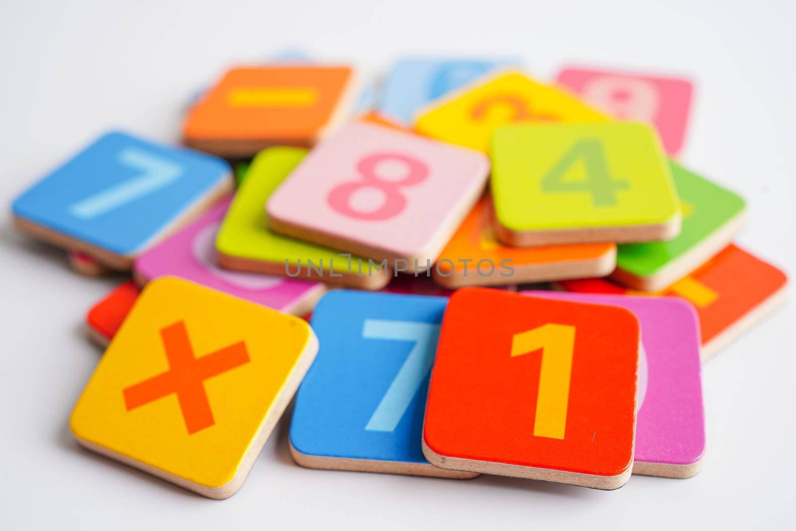 Number wood block cubes for learning Mathematic, education math concept.
