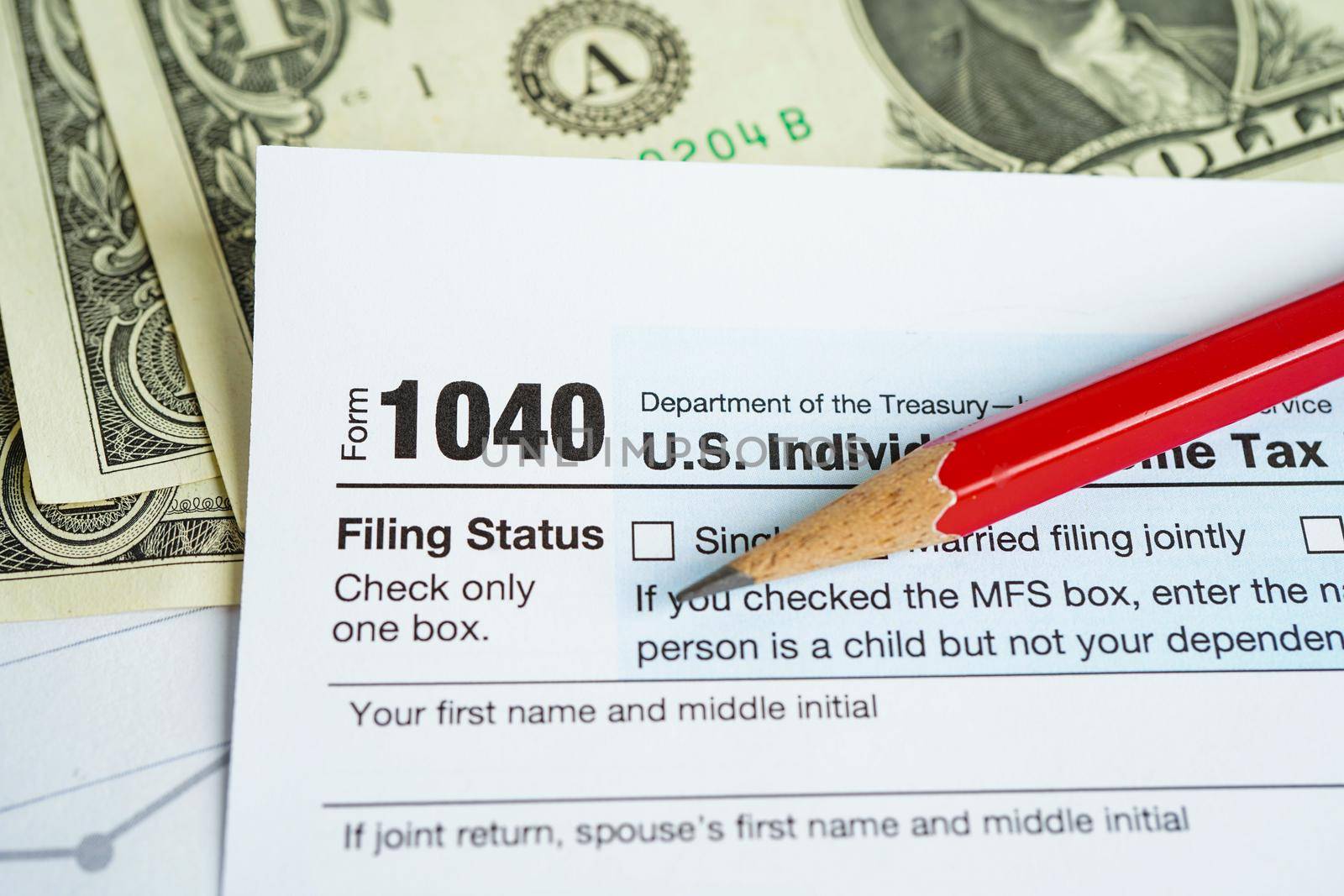 Tax form 1040 U.S. Individual Income Tax Return, business finance concept.