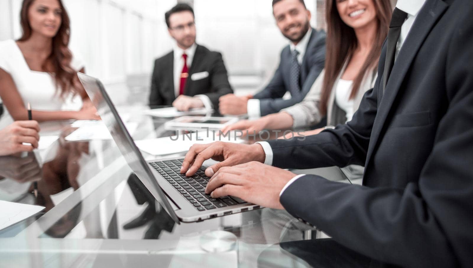 Businessman using laptop during a meeting of the Board of Directors.people and technology