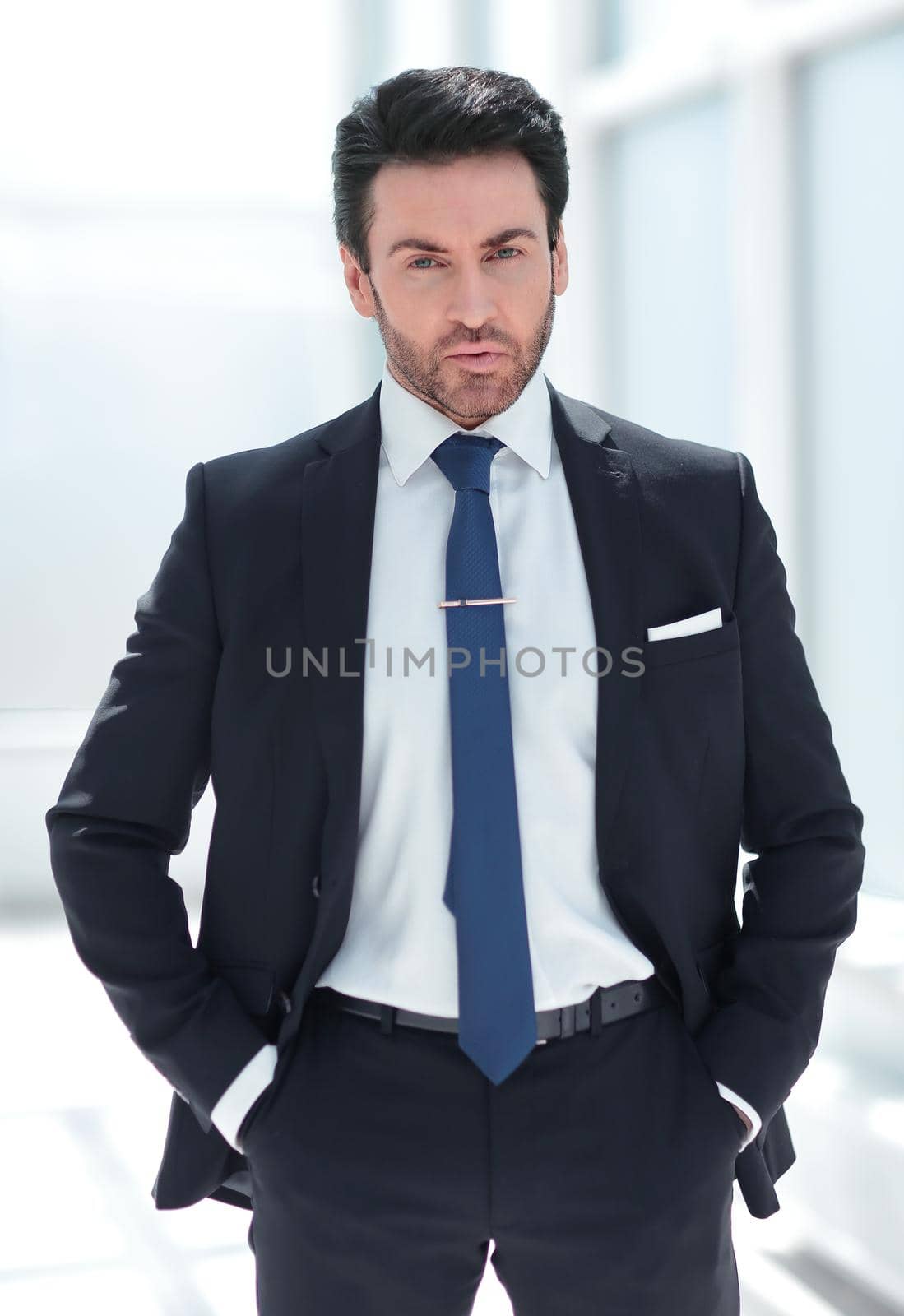 puzzled businessman looking at copy space by asdf