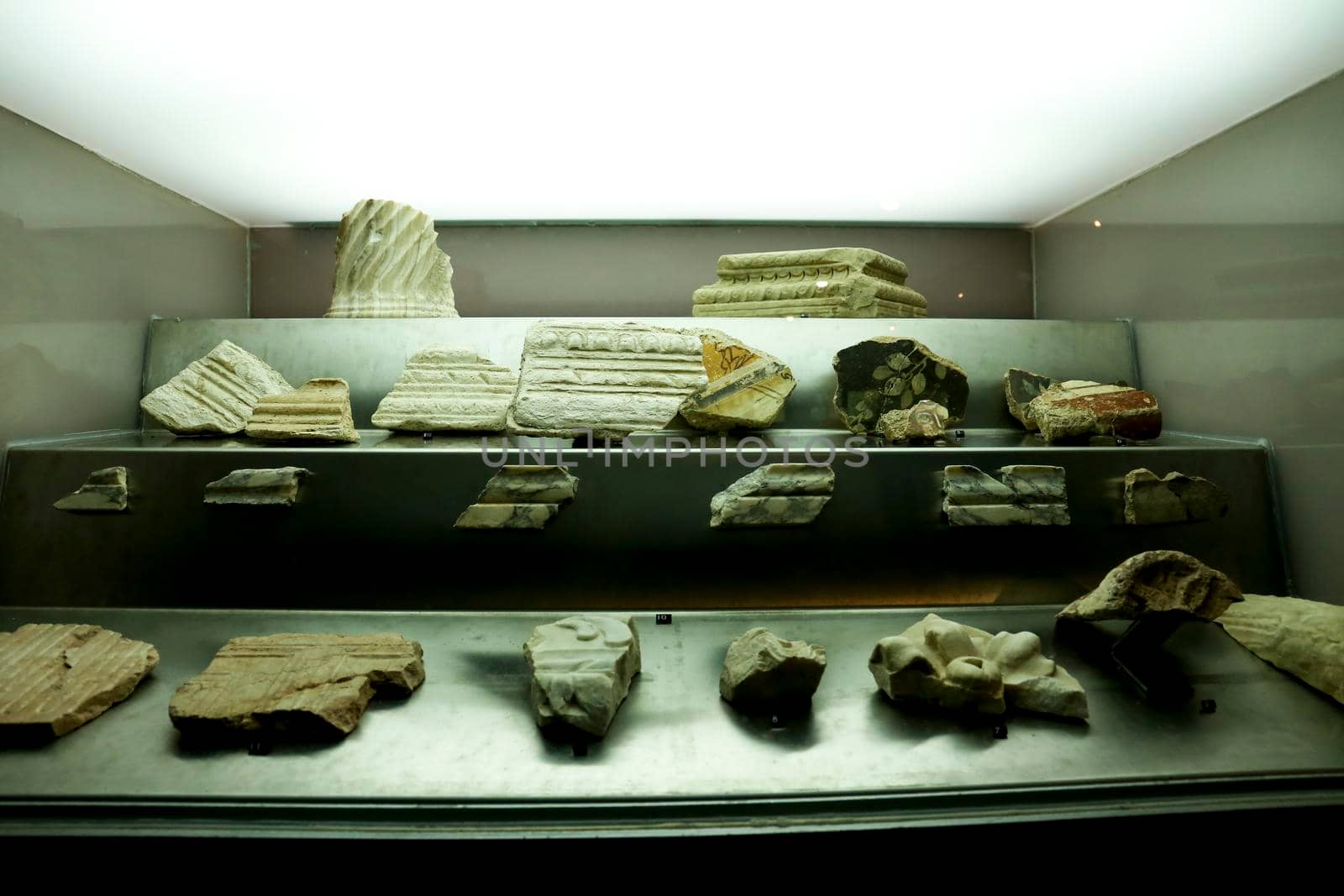 Cartagena, Murcia, Spain- July 17, 2022: Fragments of decorated cornices showed at Augusteum Museum in Cartagena, Spain
