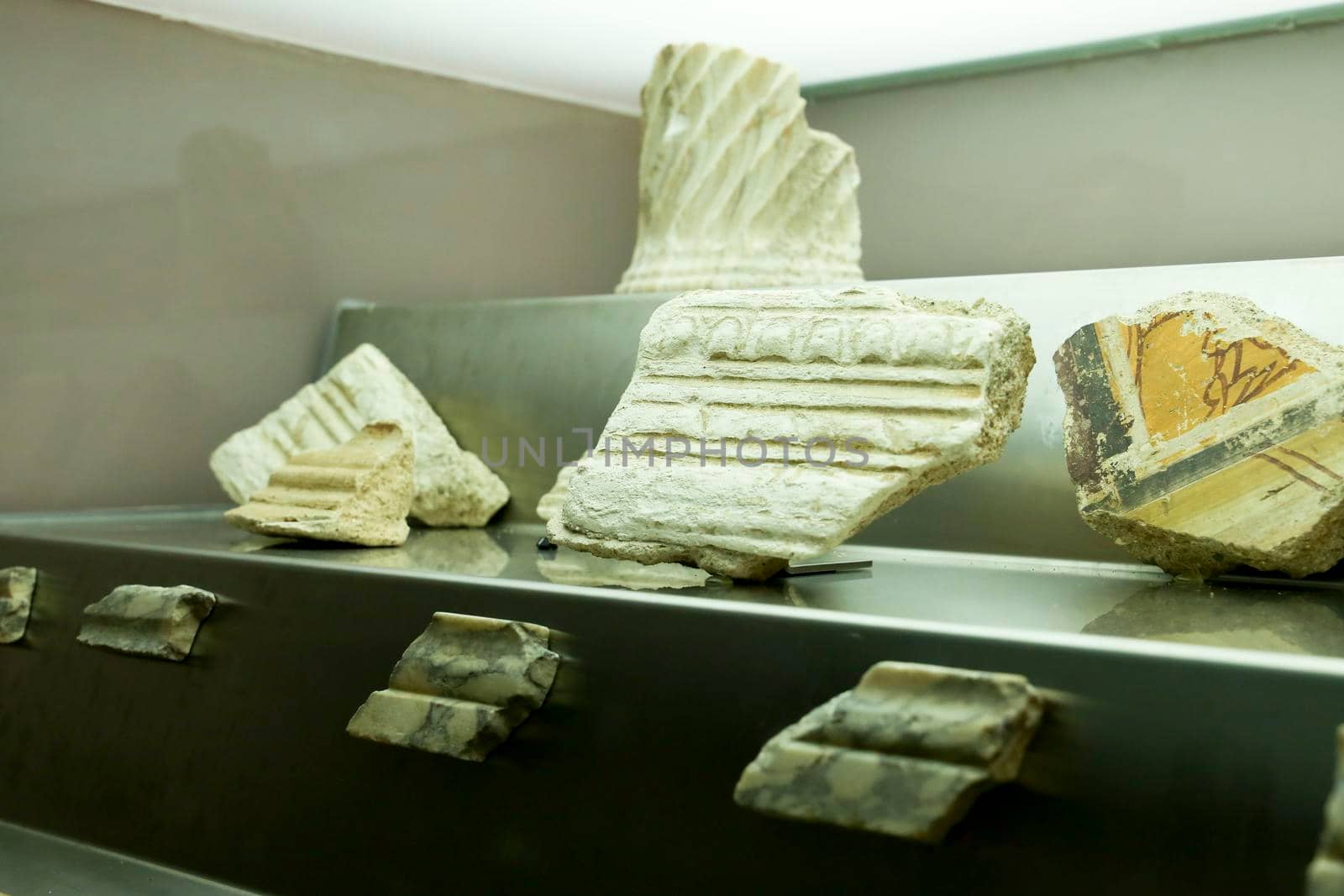 Cartagena, Murcia, Spain- July 17, 2022: Fragments of cornices of the Temple dedicated to Octavian Augustus in Cartagena, Spain