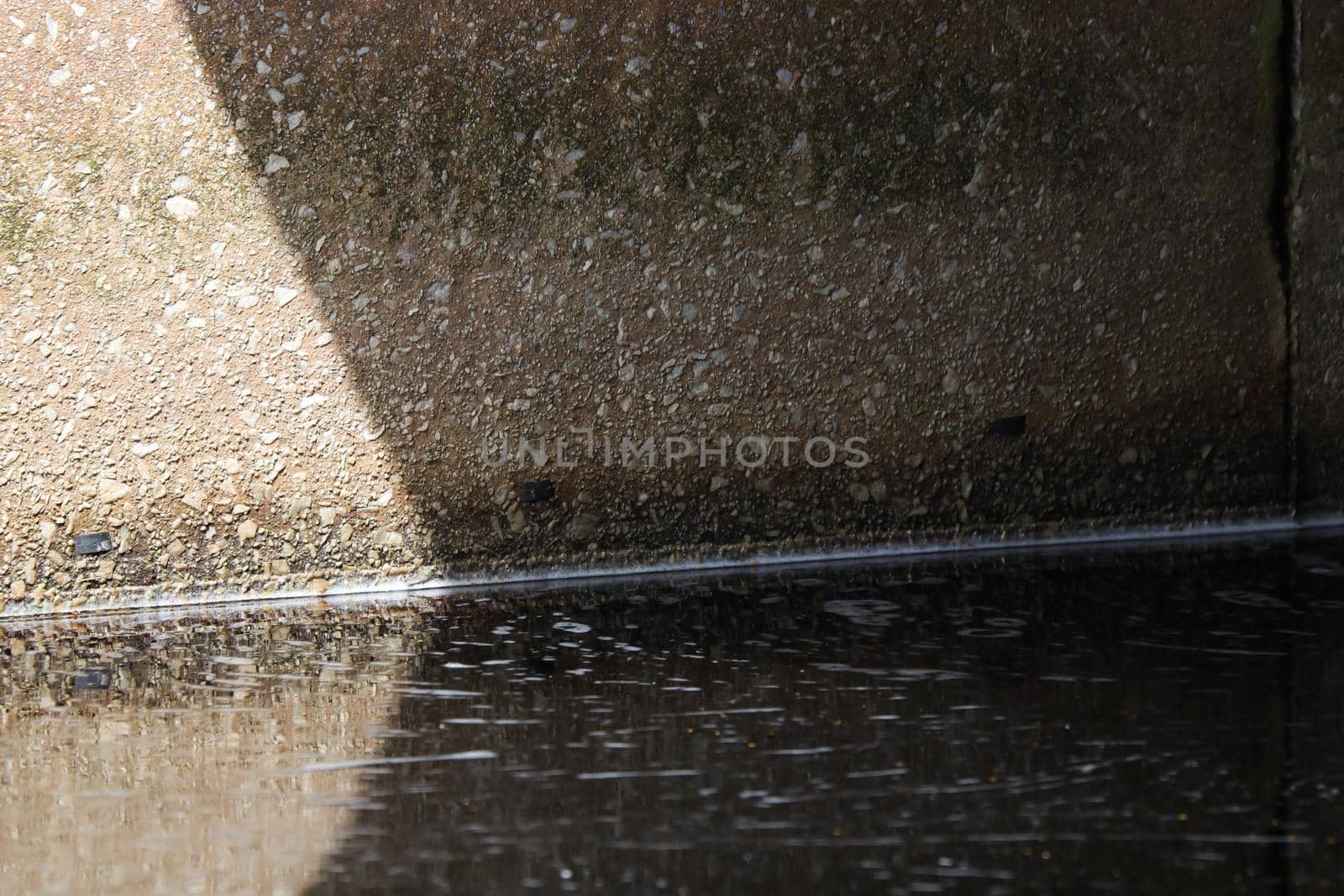 Concrete Underpass Structure With Murky Water Abstract by jjvanginkel