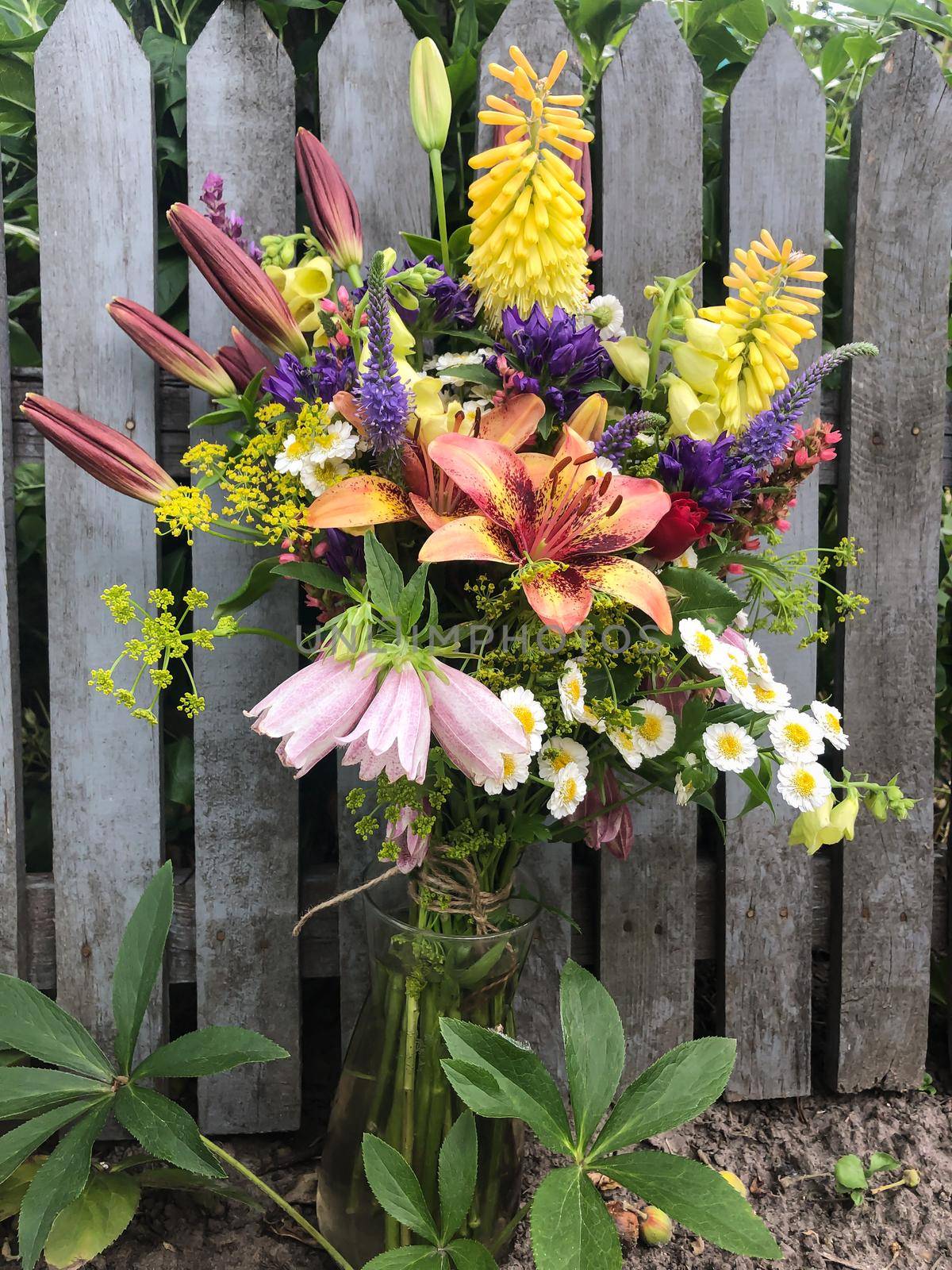 Bouquet with lilies. Home decor and flowers arranging.