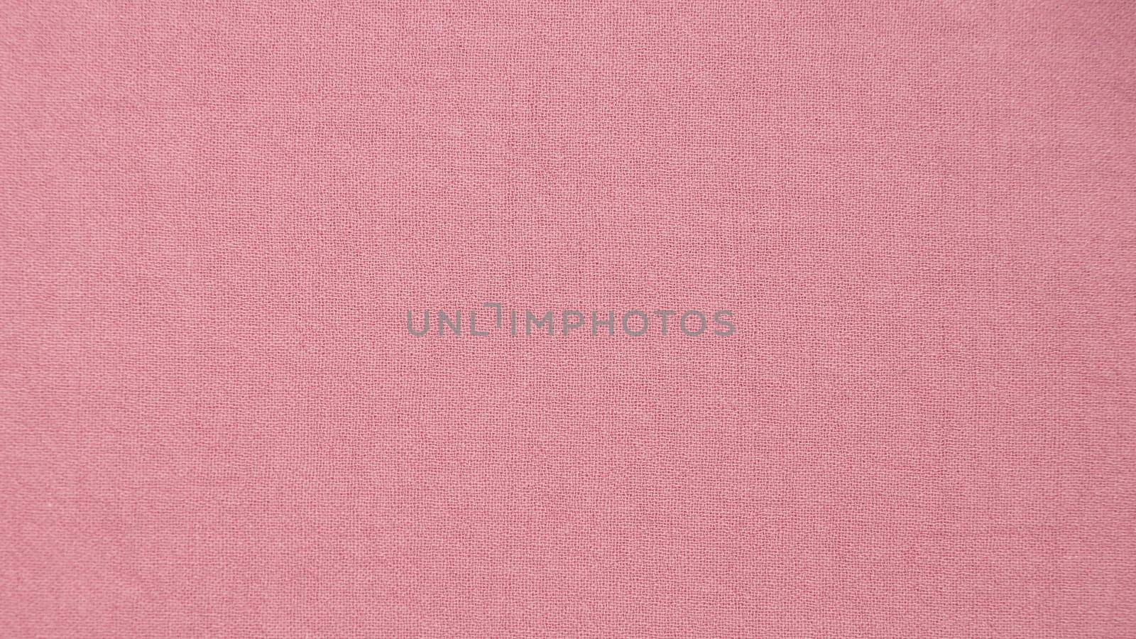 pink fabric texture for natural textile background.