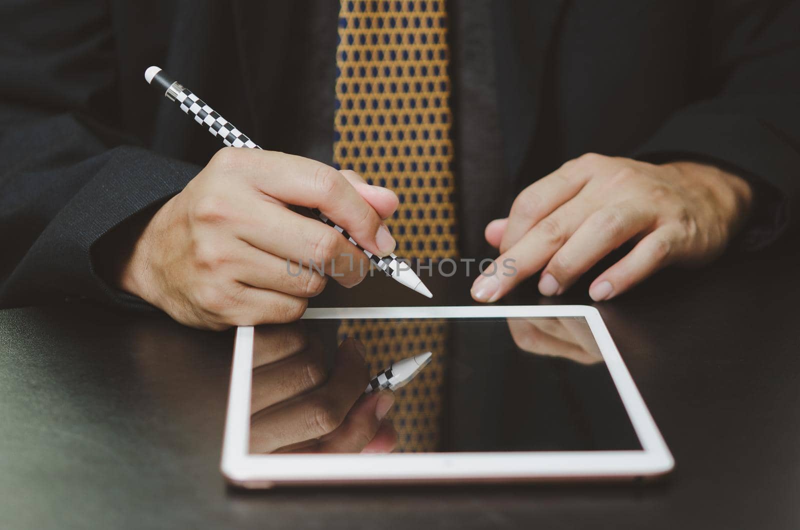 Business man sign digital online tablet contract in application on desk.
