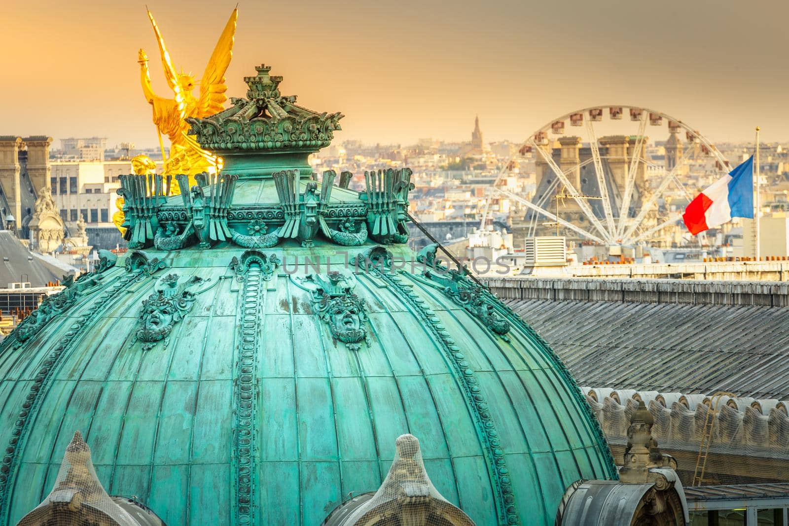 Panorama of architecture above cupola of opera in Paris at clear sky, France