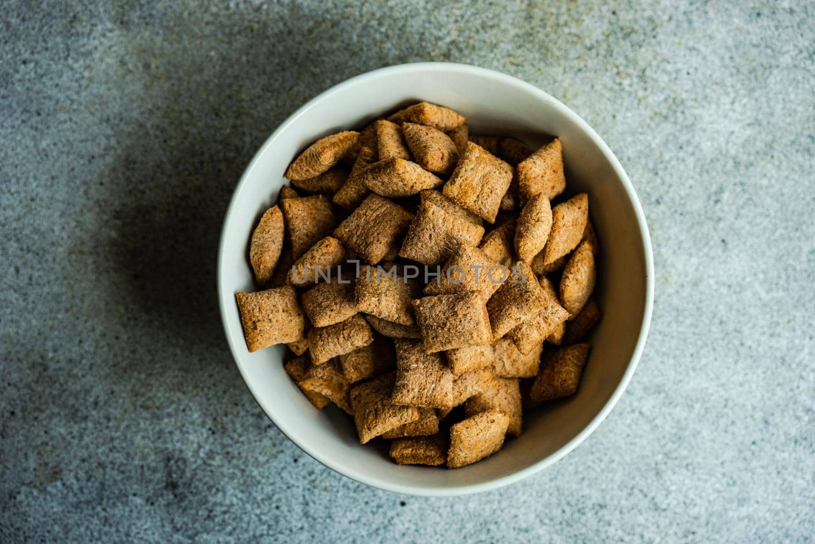 Bowl with traditional cereal breakfast by Elet