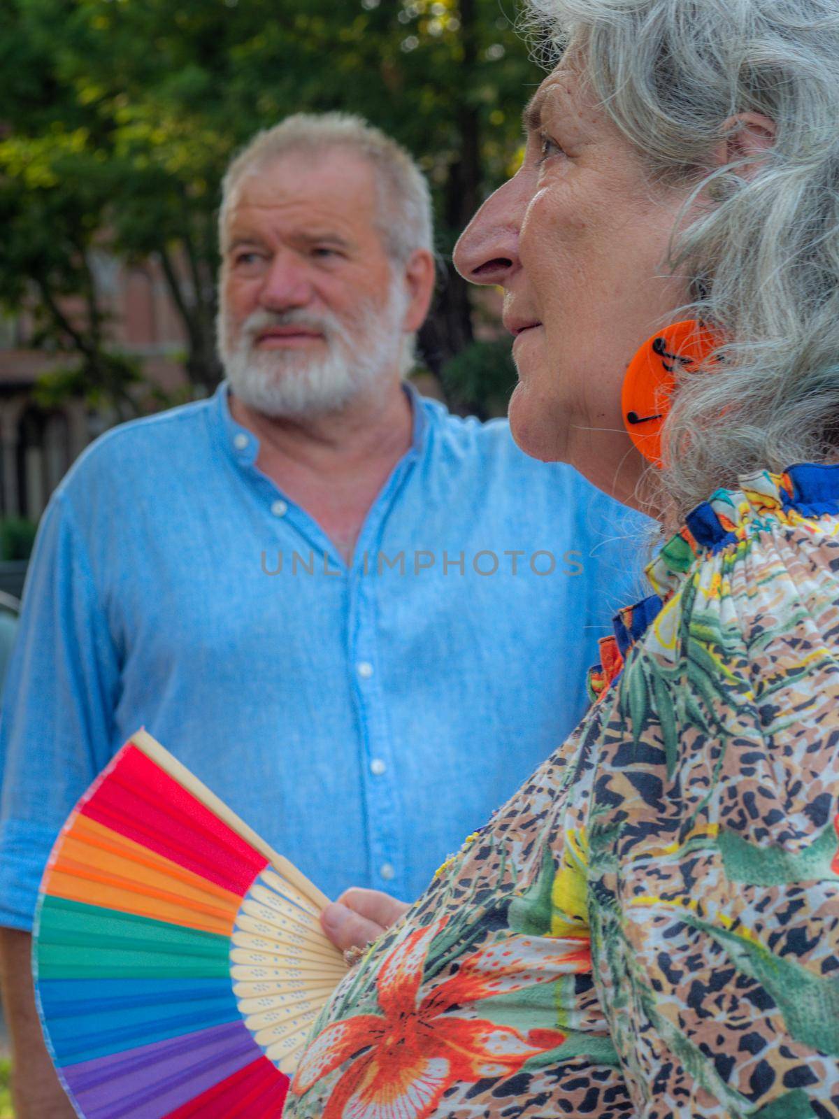 senior elegant man and fashionable lady