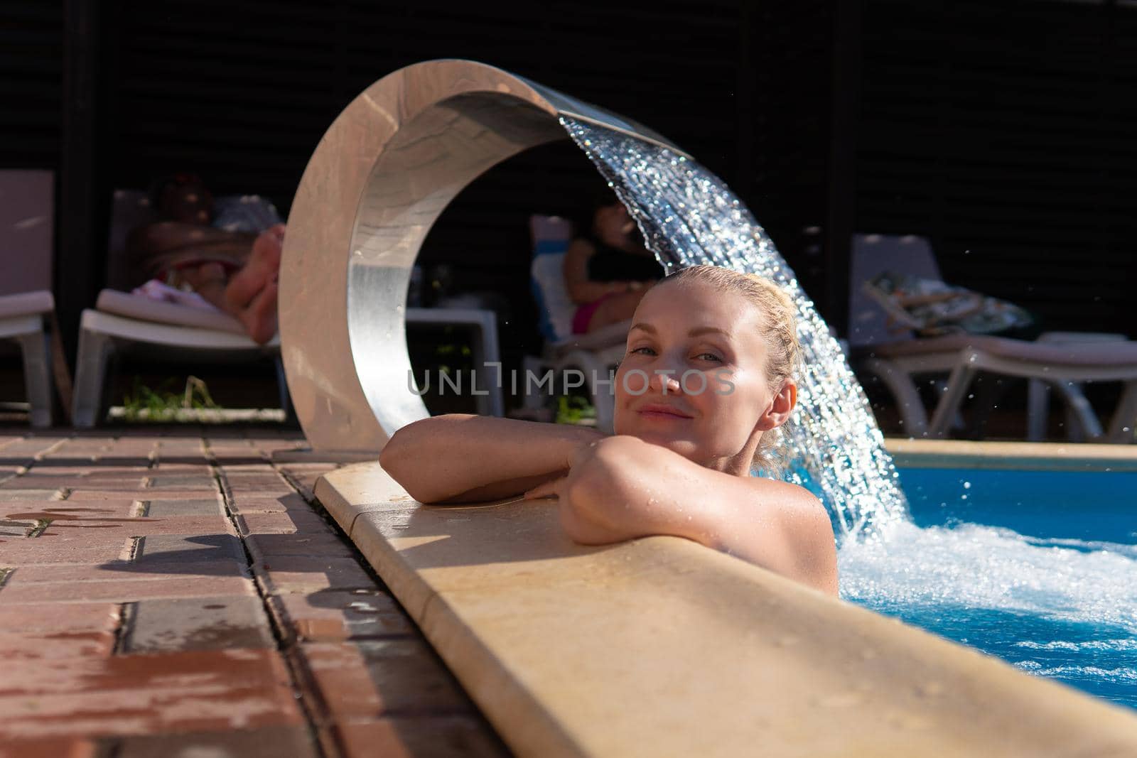 Smiling pool woman swimming young waterfall beautiful luxury outdoor relax, from wellness enjoying for wash from splashing aqua, brunette basin. Holiday gorgeous modern,