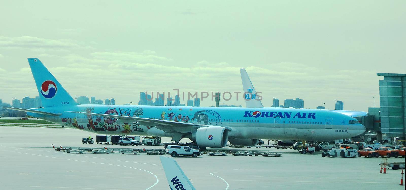 Toronto, Ontario, Canada - Oct 26 2016 Toronto Pearson Airport. A special Boeiing 777-300ER with a children drawing Love Livery