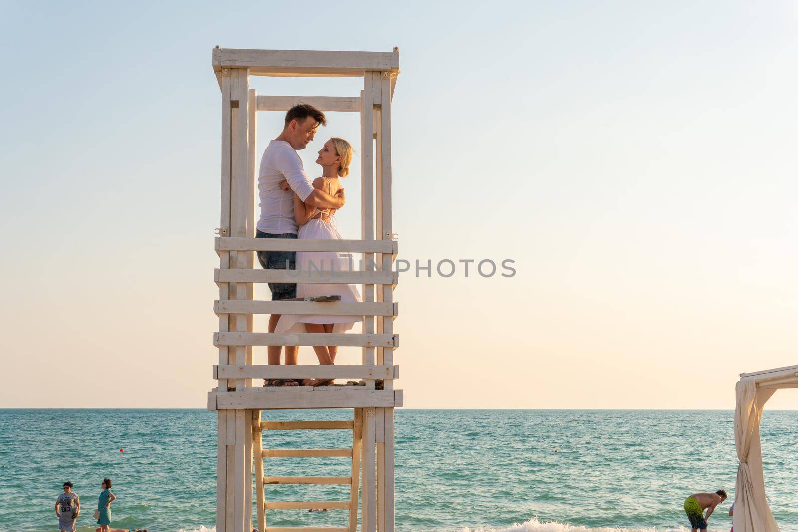 Love girl lifeguard tower guy pair paradise sunrise ocean safety, for sand saving in station from landscape holiday, iconic australia. Protect sun lifesaver,