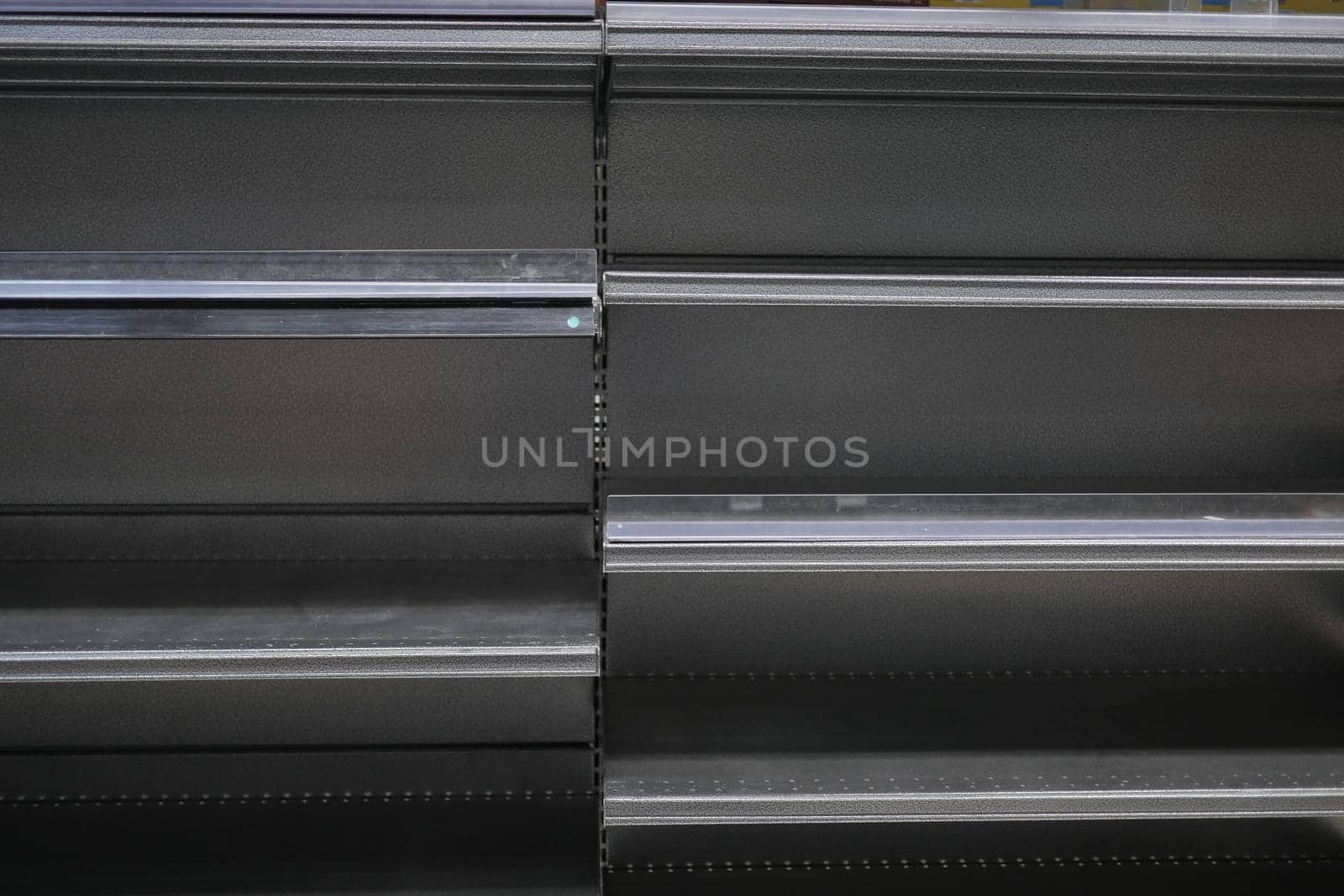 Empty supermarket shelves, selective focus ,