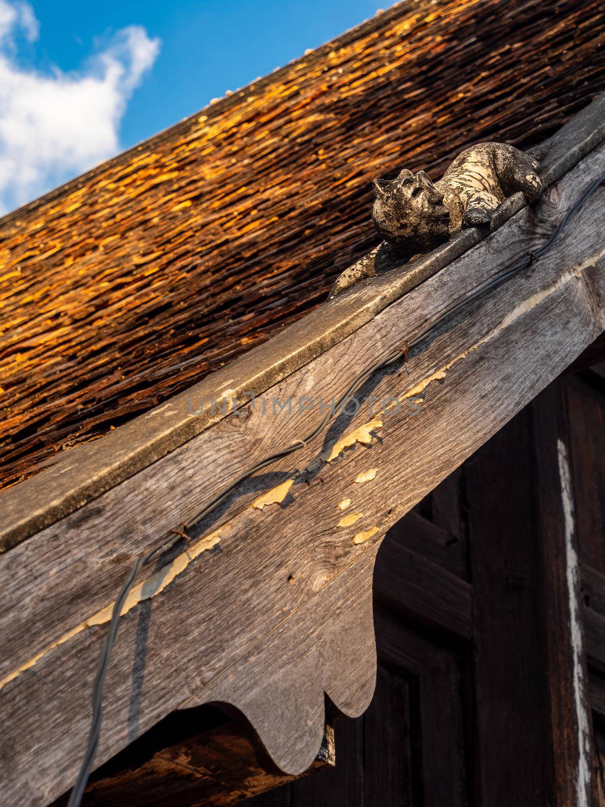 Sculpture of Mom at the roof of temple building in Northern Provinces of Thailand. "Mom" is a Himmapan animal According to the beliefs of the Lanna people