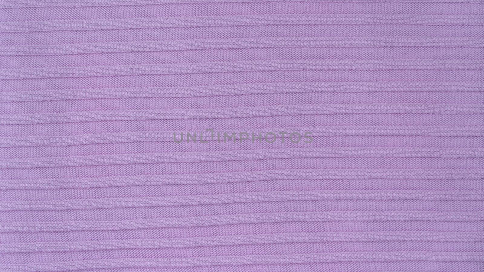 Cotton synthetic fabric is a voluminous horizontal strip of lilac color. High quality photo