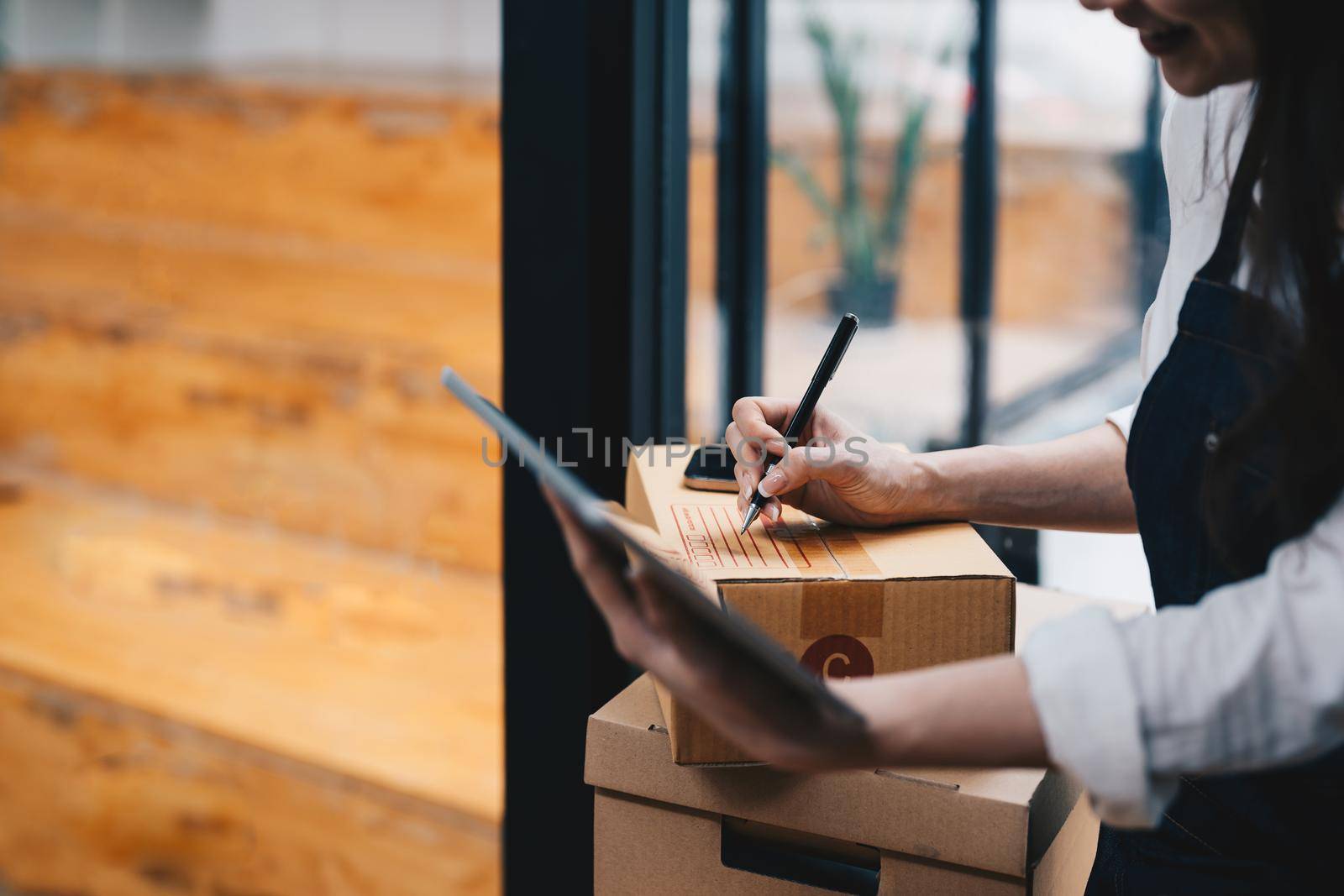 Small business aspiring entrepreneur, asian freelance worker working in a home office