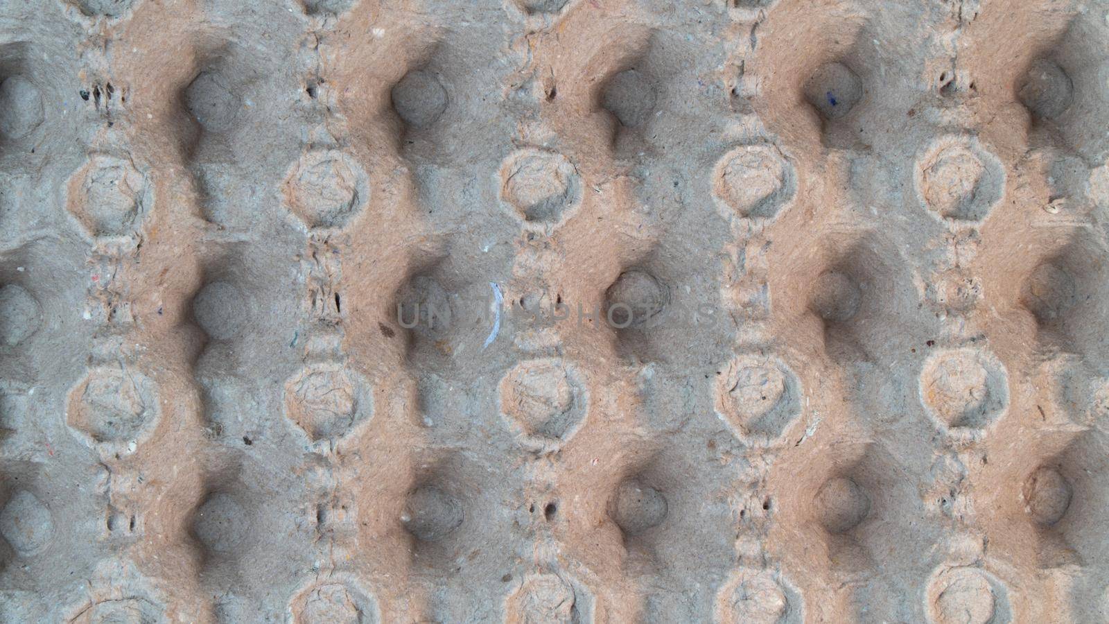 gray lattice from under the egg close-up texture three-dimensional