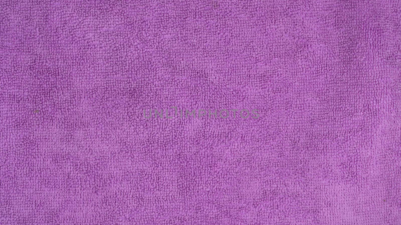 Purple Microfiber Texture Fabric Pile Background. High quality photo