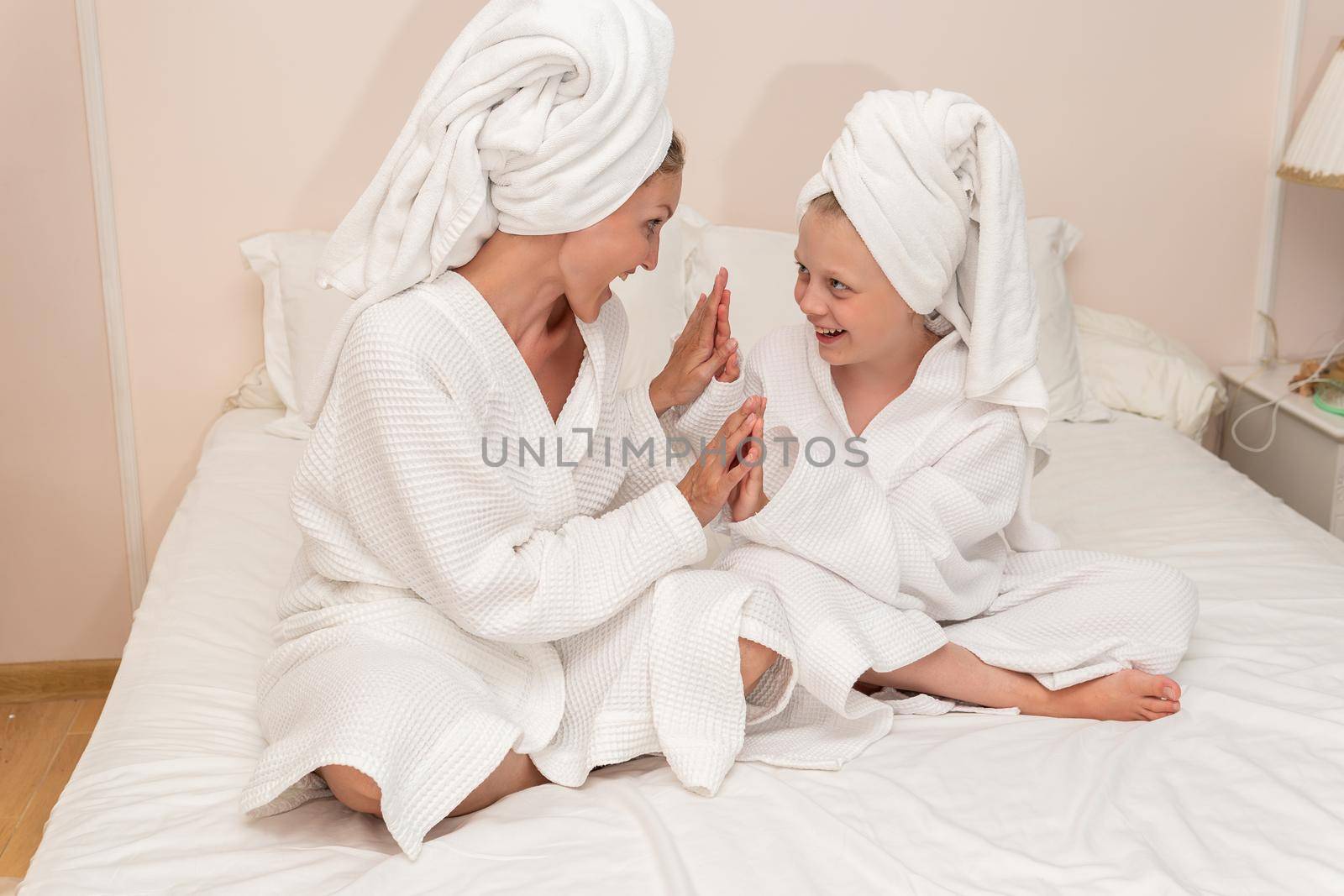 Daughter love dries bath mom smiling thinks elbows coffee bathrobe, from girl hygiene in dressing and happy spa, pirate background. Care kid comfort, by 89167702191