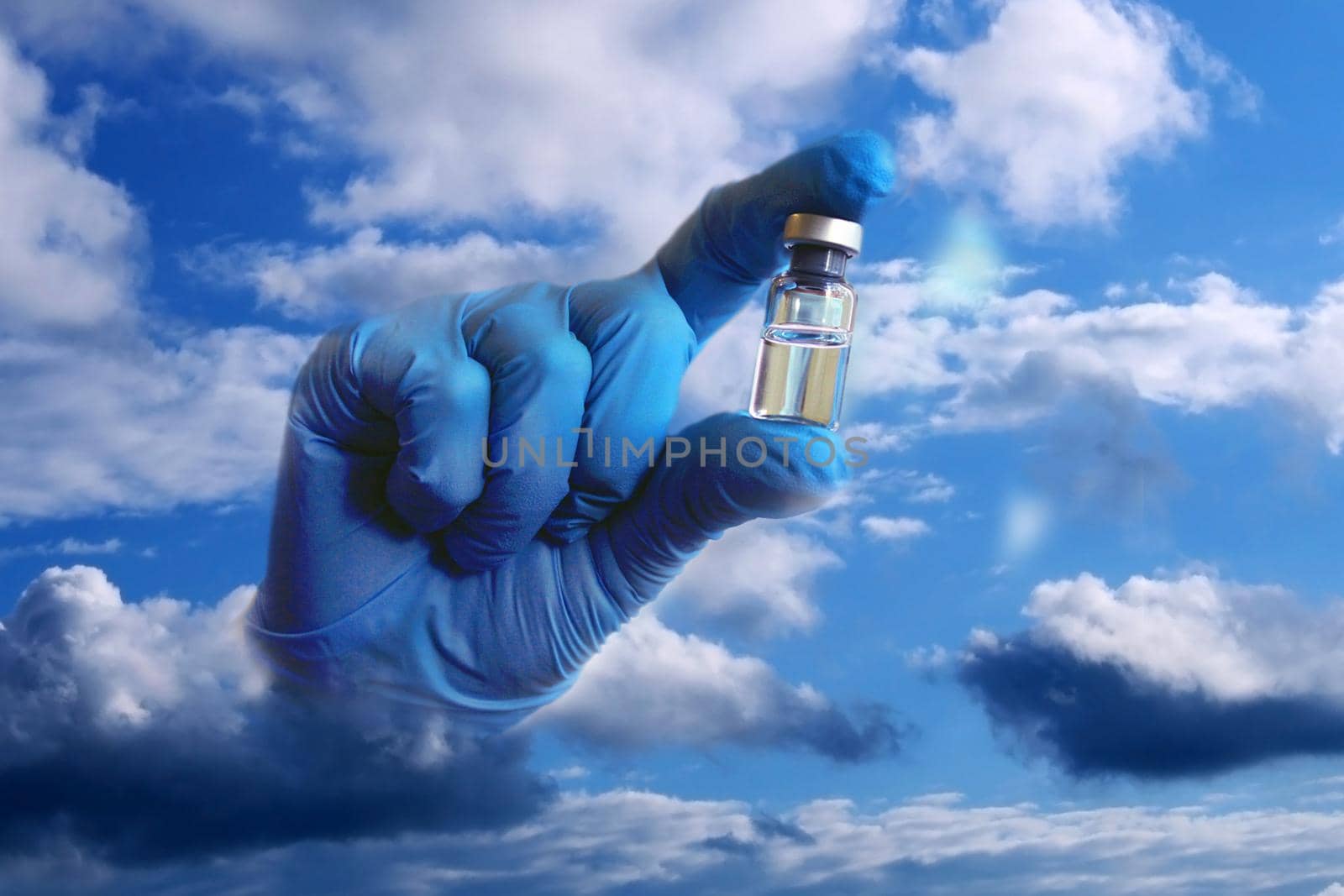 A hand in a blue medical glove sticks out of the clouds and holds out a vial of vaccine. Collage..