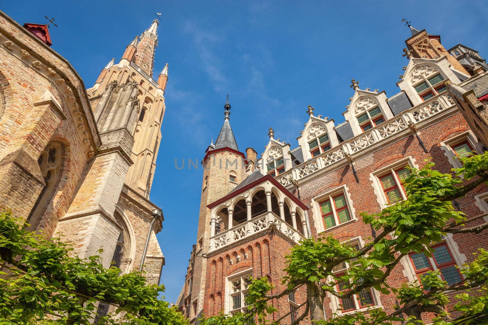 Church of our lady bell tower in Brugge at blue sky, Belgium