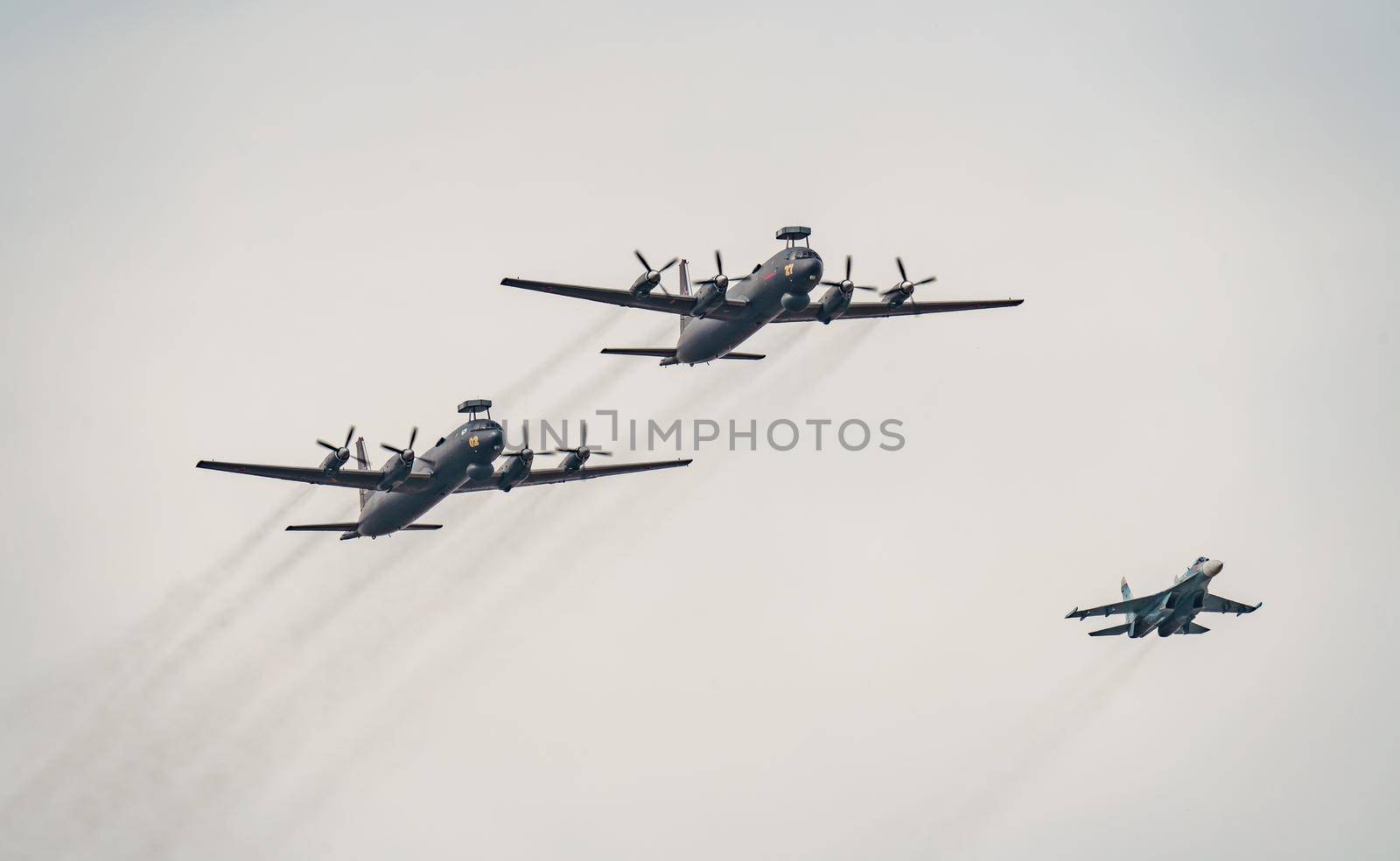 Russia, St. Petersburg, 28 July 2022: Military aircraft and helicopters of the air force fly on the city at the celebration of the Day of the Navy, amphibious and transport aircraft, anti-submarine. High quality photo