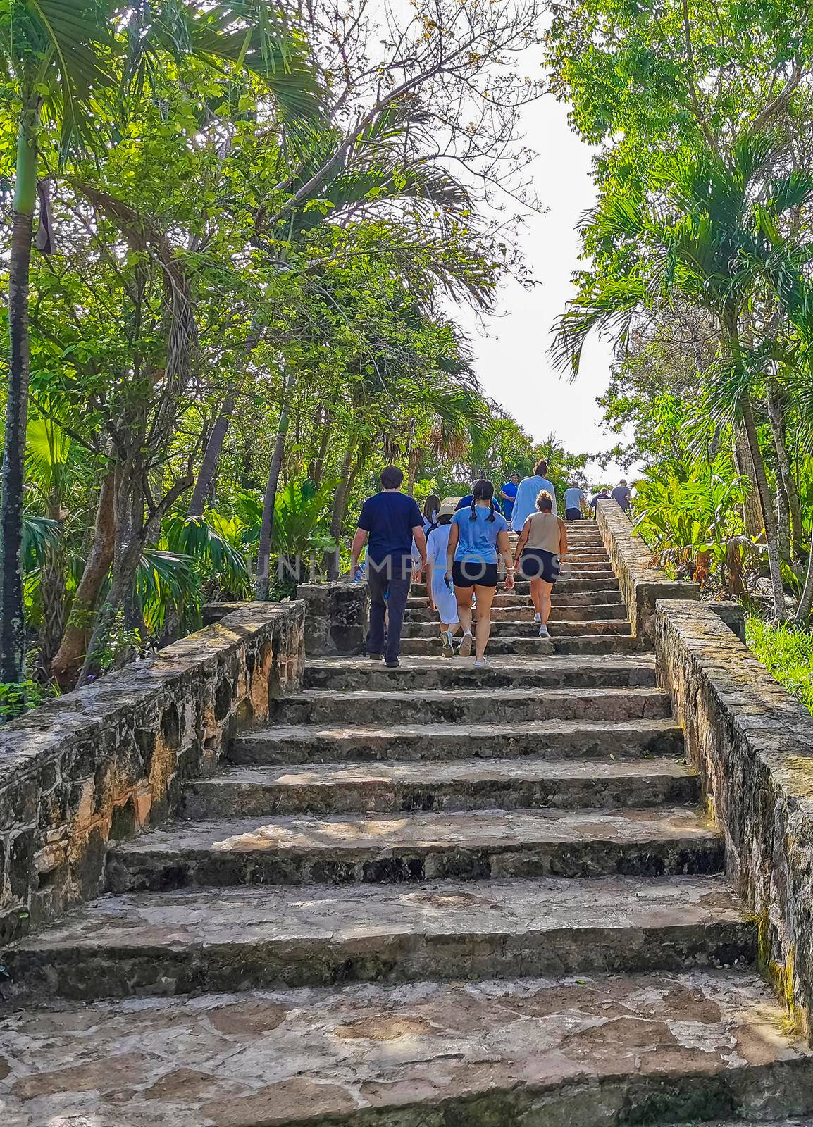 Tulum Mexico 22. June 2022 Ancient Tulum ruins Mayan site with temple ruins pyramids and artifacts in the tropical natural jungle forest palm and seascape panorama view in Tulum Mexico.